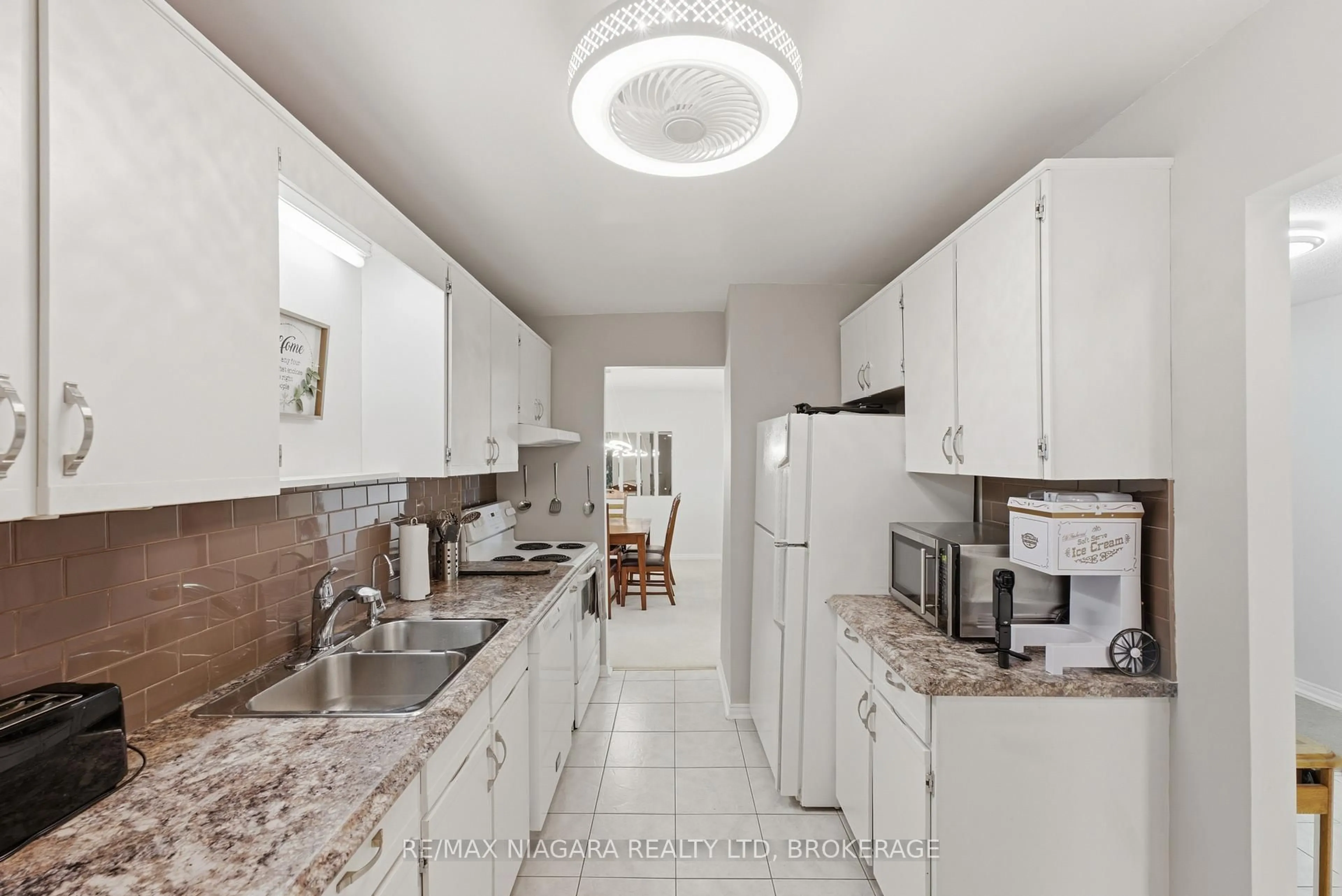 Standard kitchen, ceramic/tile floor for 141 Church St #1003, St. Catharines Ontario L2R 7L7