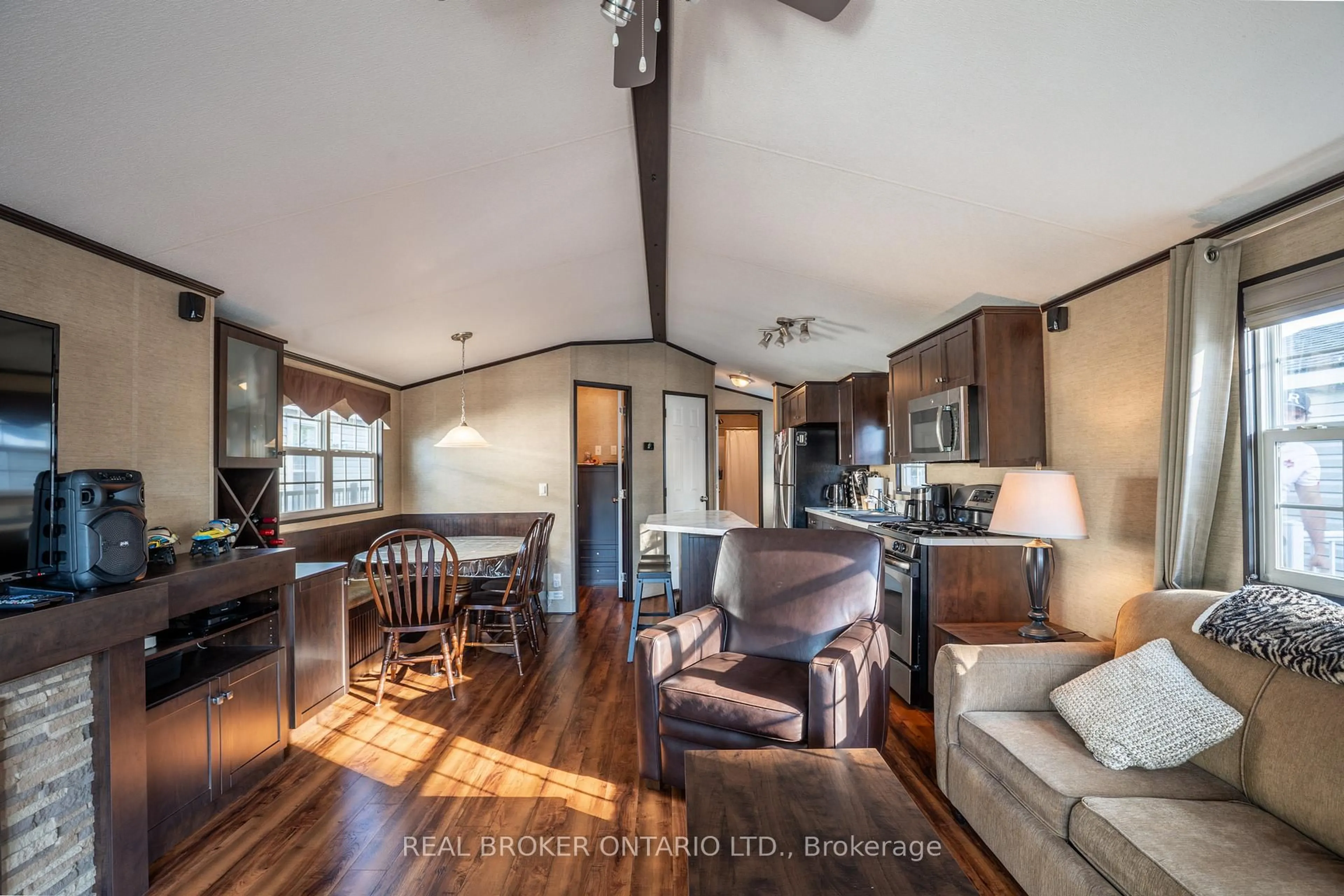 Open concept kitchen, wood/laminate floor for 1082 Shamrock Marina Rd #16, Gravenhurst Ontario P0E 1N0
