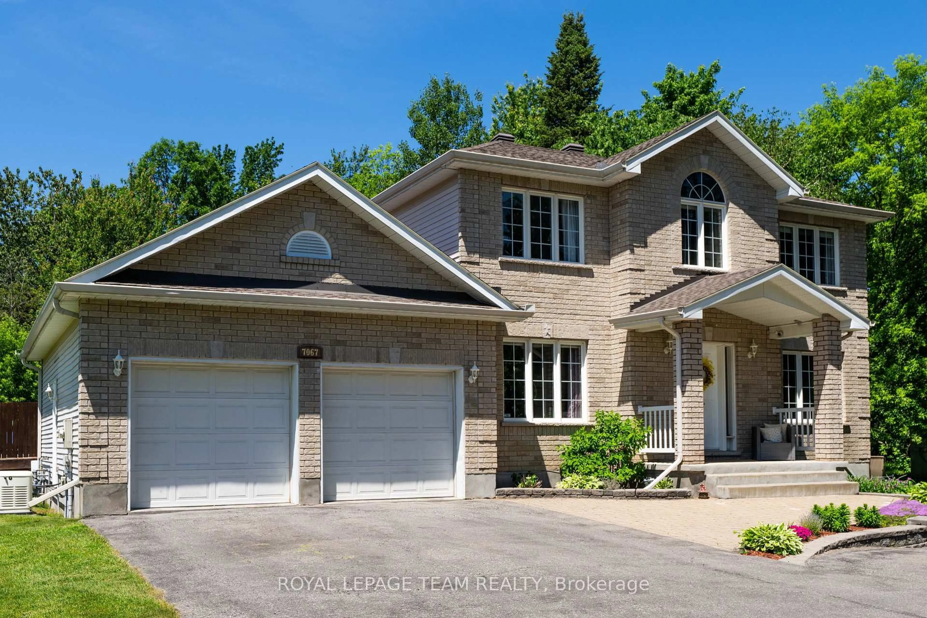 Home with brick exterior material, street for 7067 Donwel Dr, Greely Ontario K4P 1M7