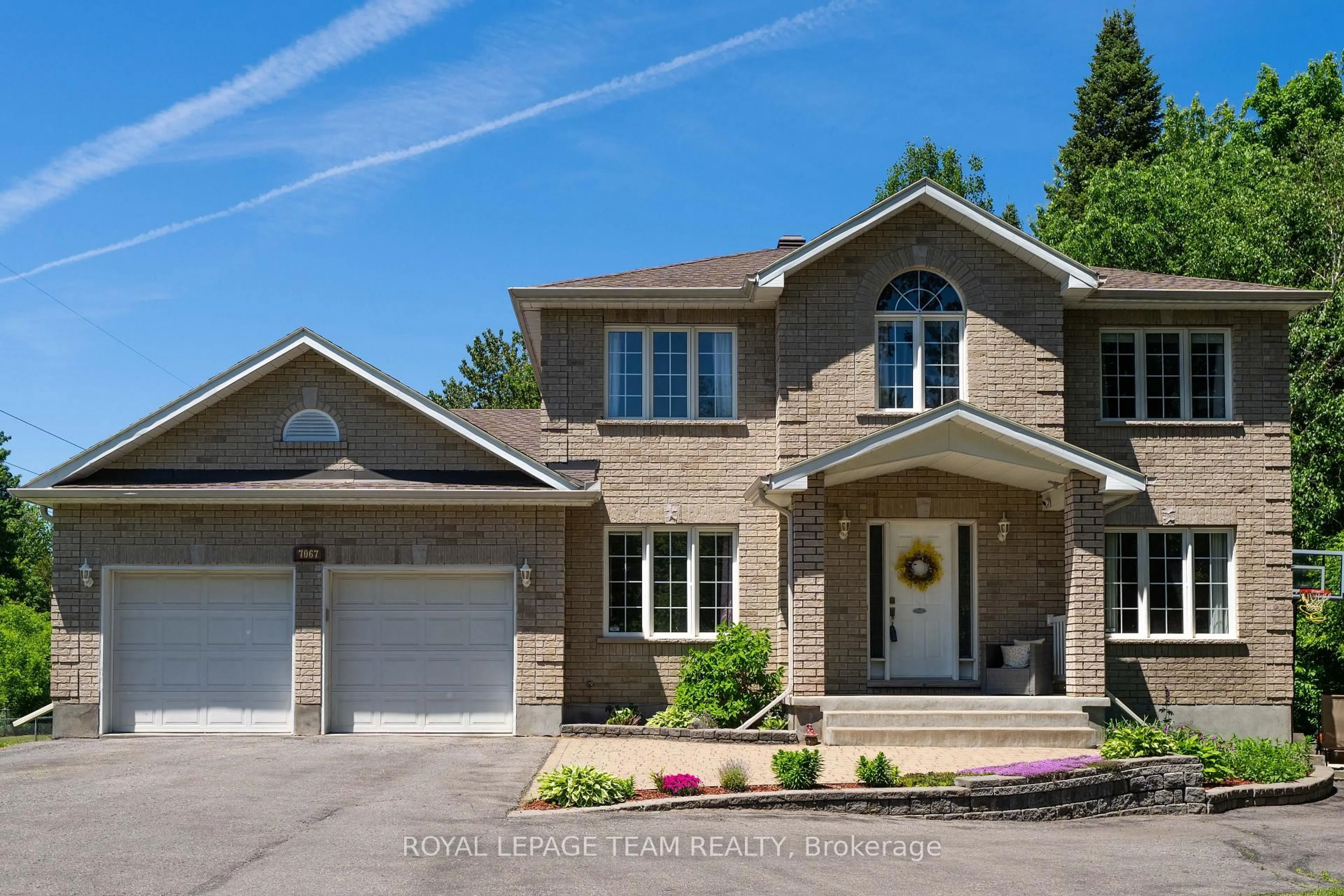 Home with brick exterior material, street for 7067 Donwel Dr, Greely Ontario K4P 1M7