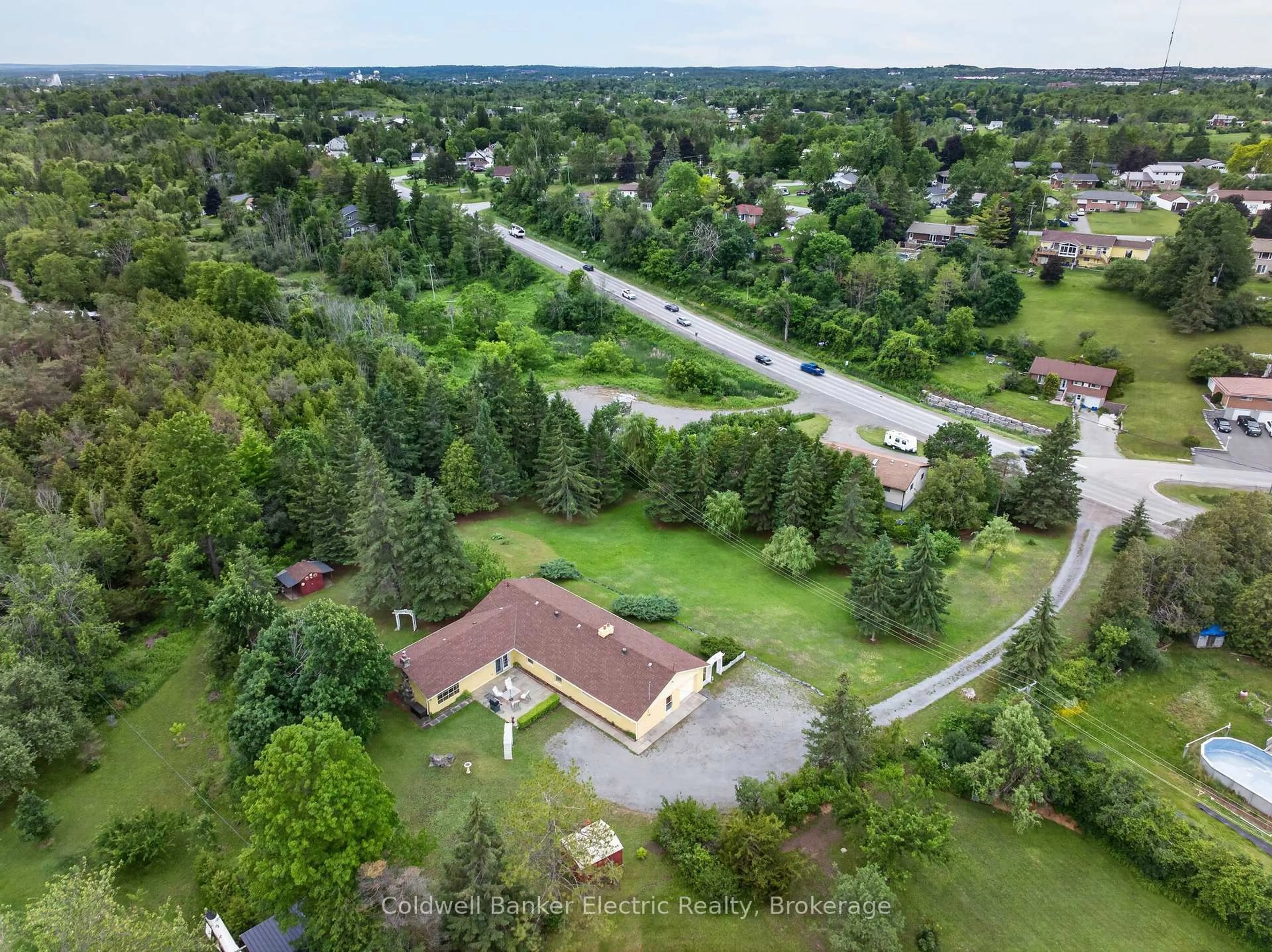 A pic from outside/outdoor area/front of a property/back of a property/a pic from drone, street for 97 County Rd 4 Rd, Douro-Dummer Ontario K9L 1V5