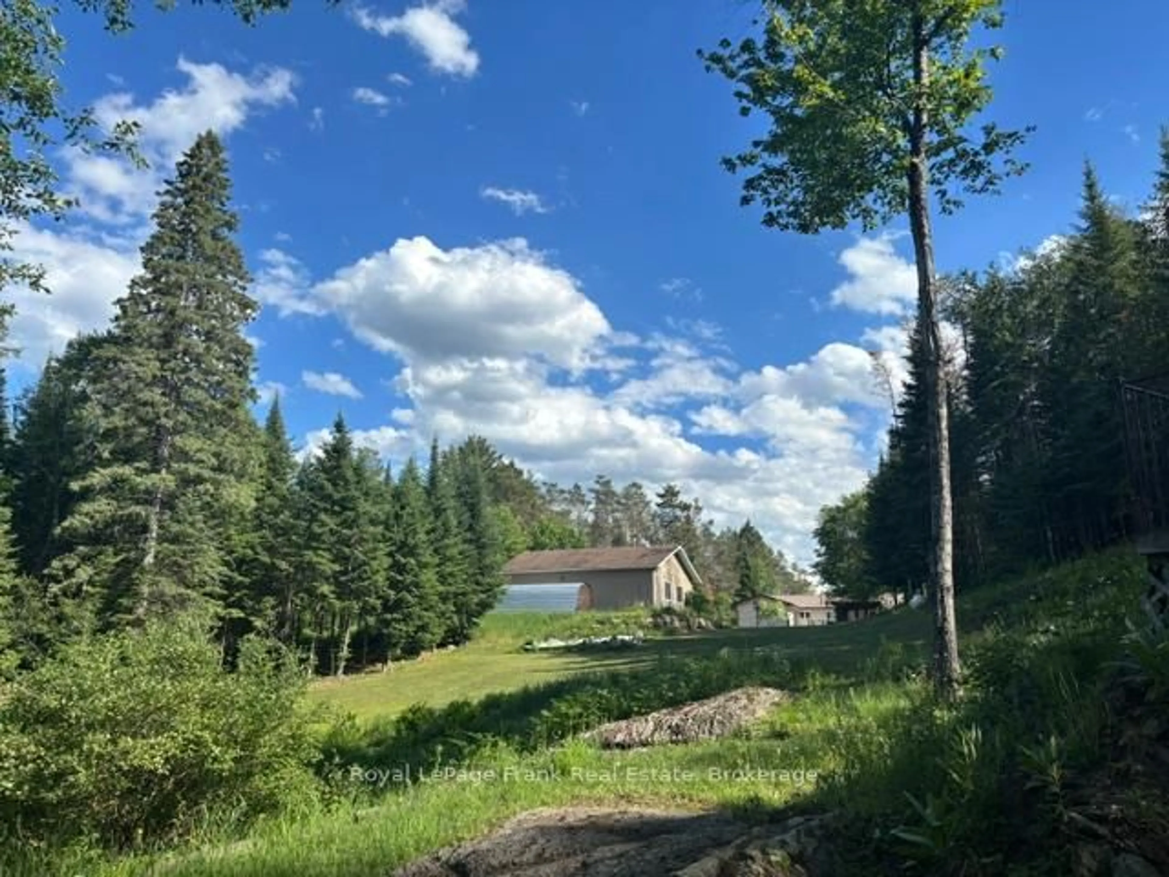 A pic from outside/outdoor area/front of a property/back of a property/a pic from drone, forest/trees view for 5794 Highway 620, Coe Hill Ontario K0L 1P0