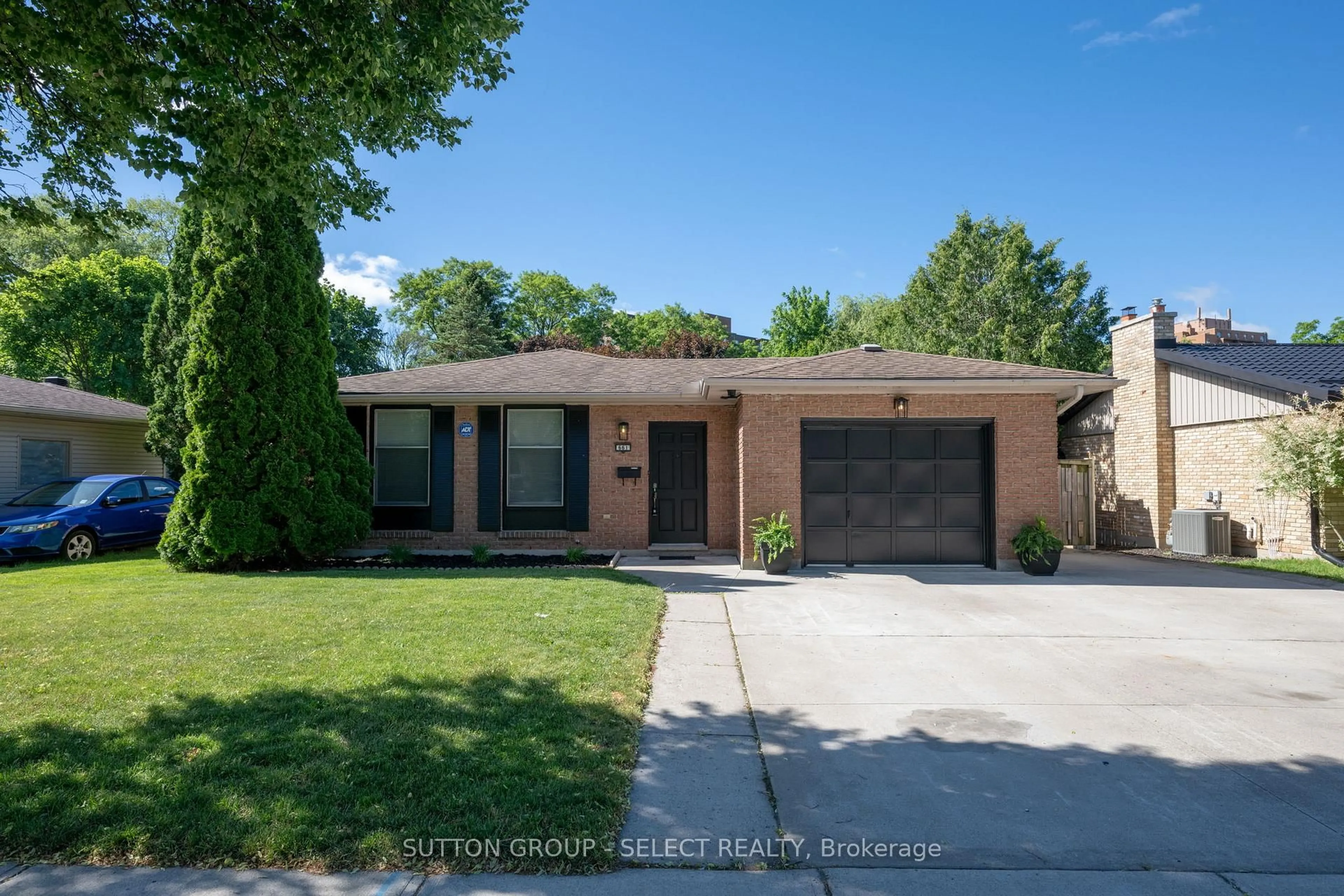 Home with brick exterior material, street for 661 Grenfell Dr, London North Ontario N5X 2C4
