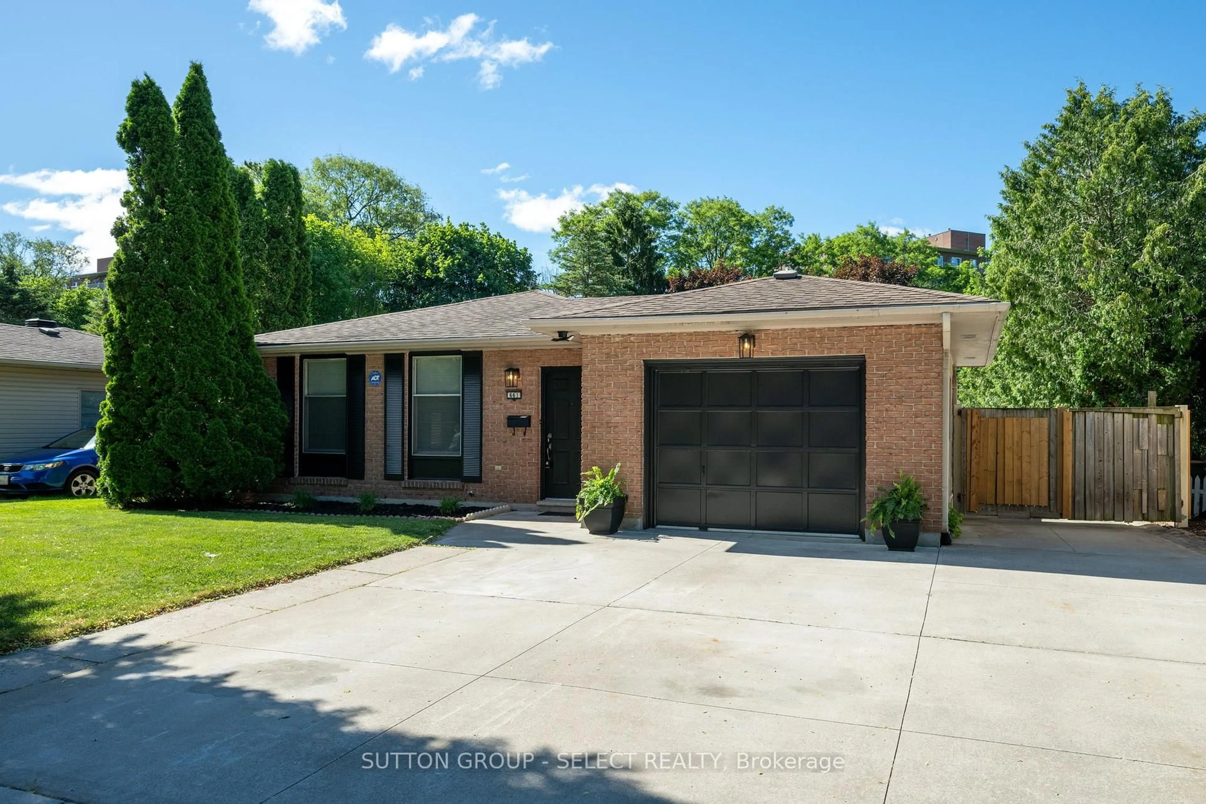 Home with brick exterior material, street for 661 Grenfell Dr, London North Ontario N5X 2C4
