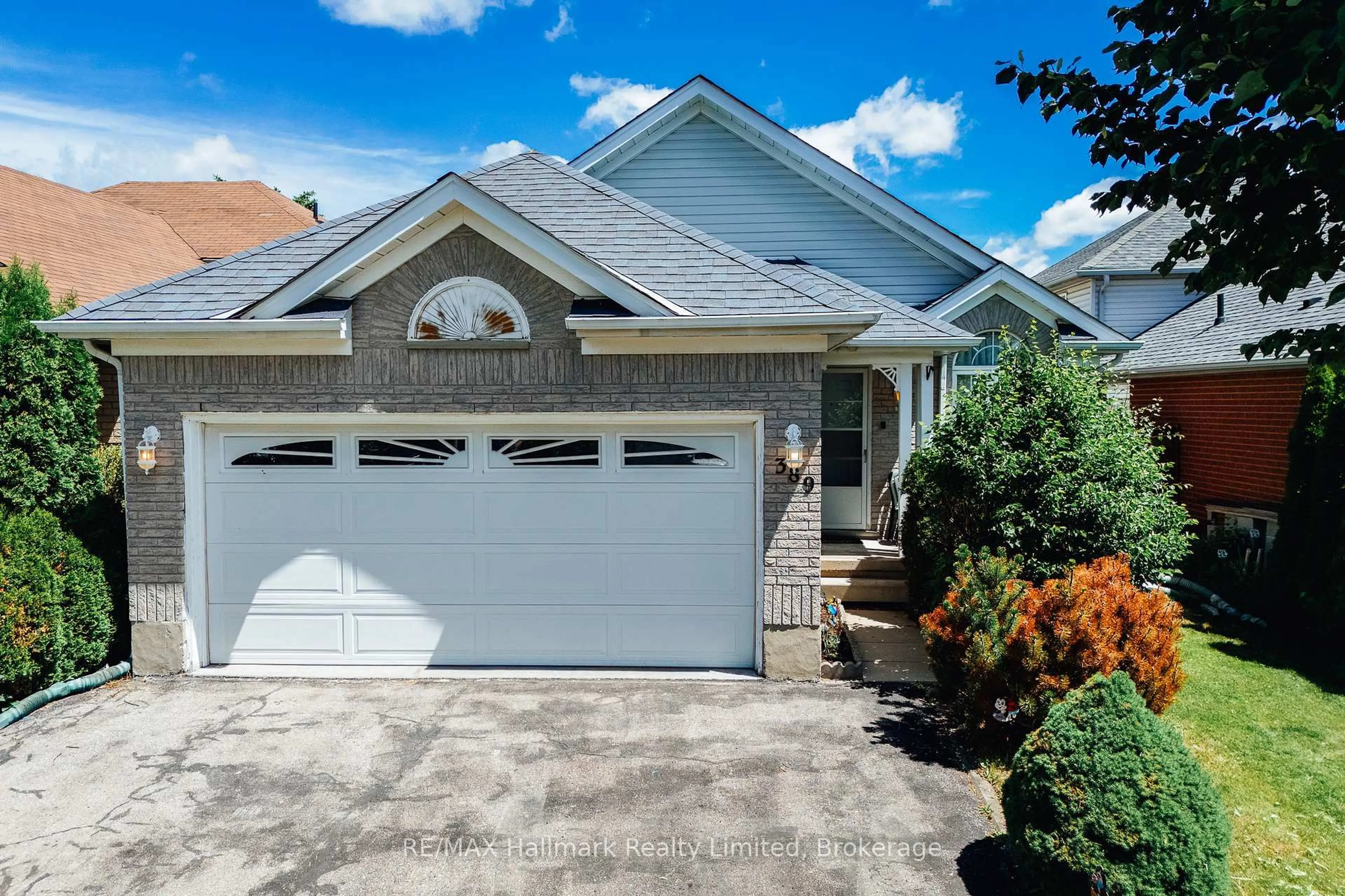 Home with vinyl exterior material, street for 389 Starwood Dr, Guelph Ontario N1E 7A3