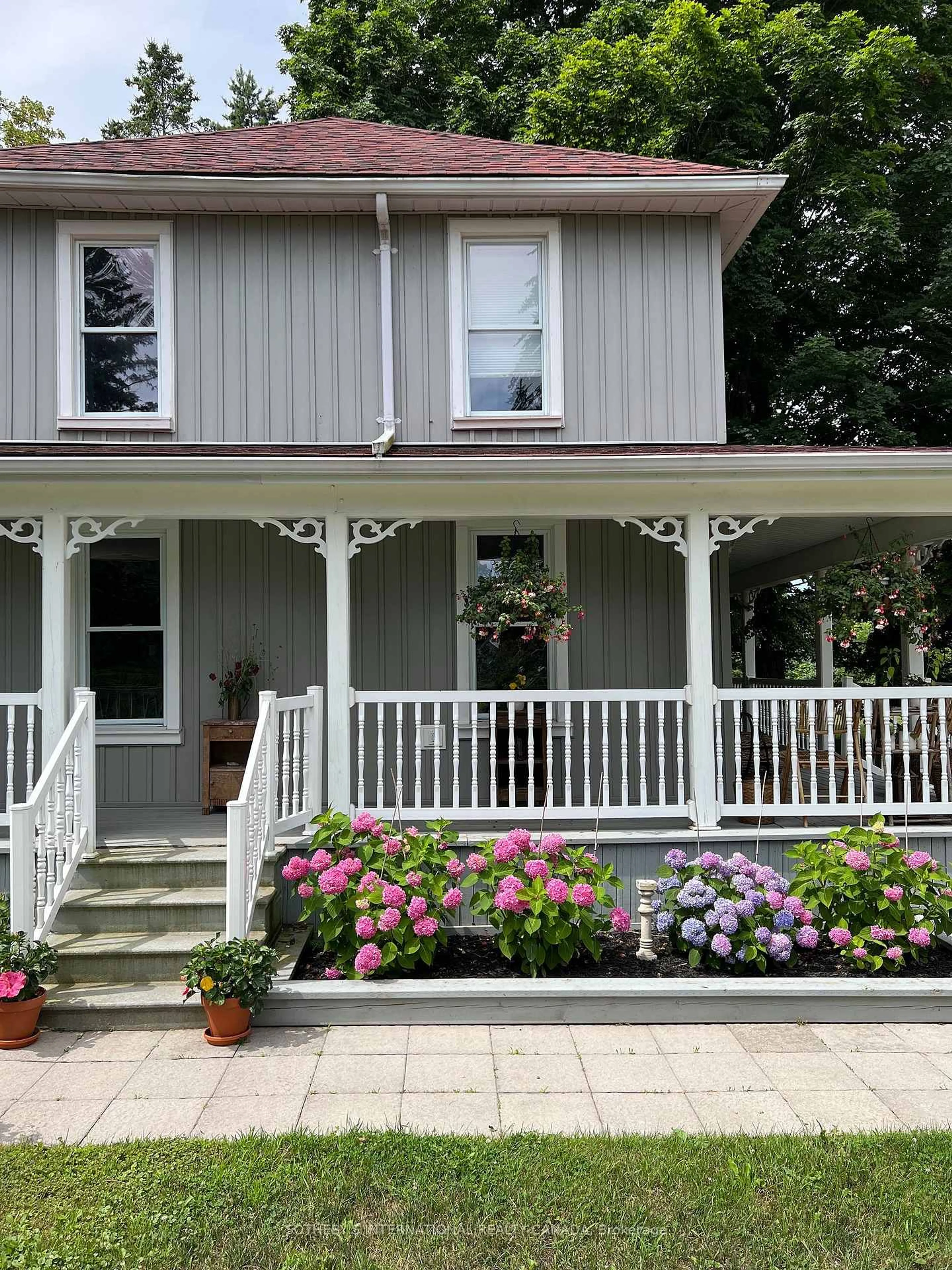 Home with vinyl exterior material, street for 3050 County Road 7, Prince Edward County Ontario K0K 2T0