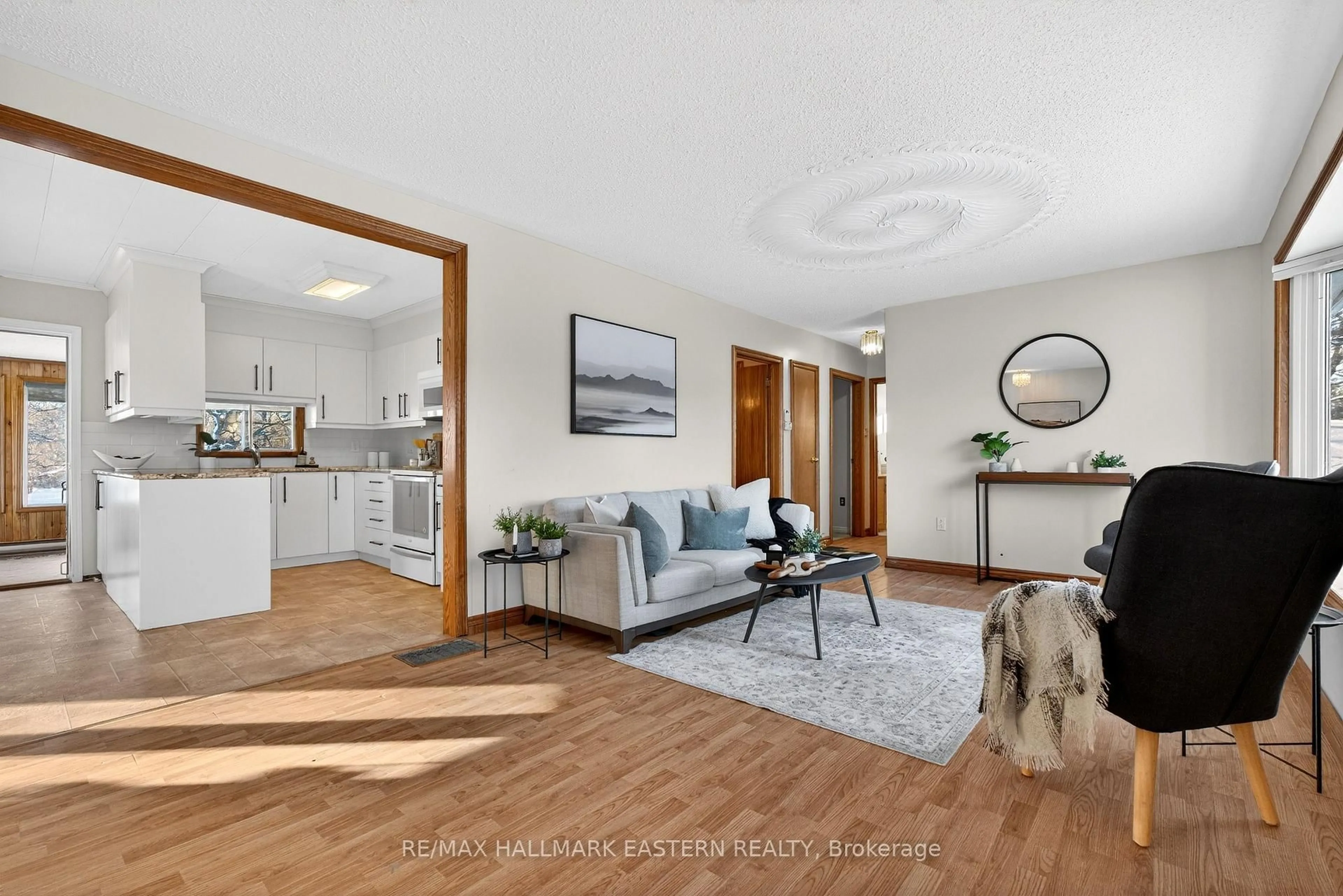Living room with furniture, wood/laminate floor for 273 Victoria St, Trent Hills Ontario K0L 1L0