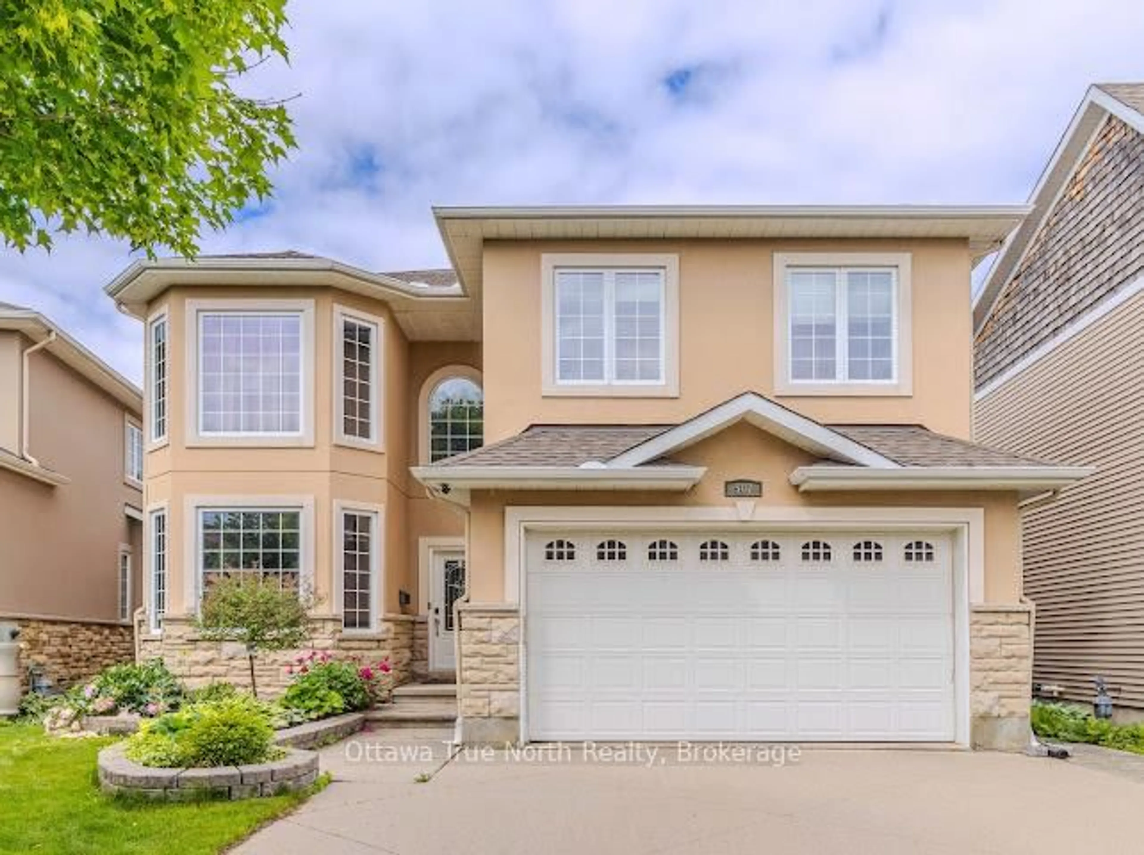 Home with brick exterior material, street for 507 Kochar Dr, Ottawa Ontario K2C 4G9