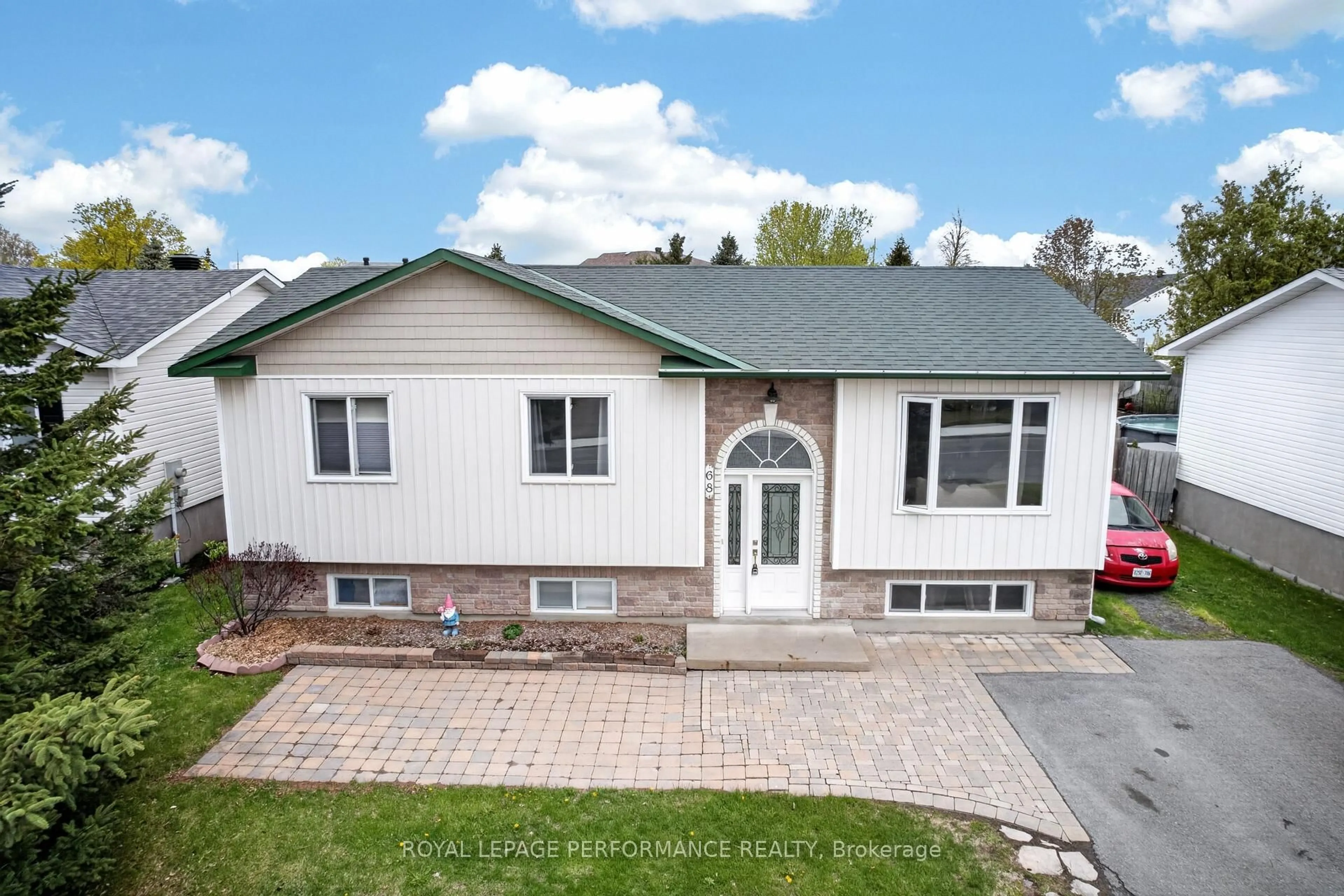 Home with vinyl exterior material, street for 68 Lafleche Blvd, Casselman Ontario K0A 1M0