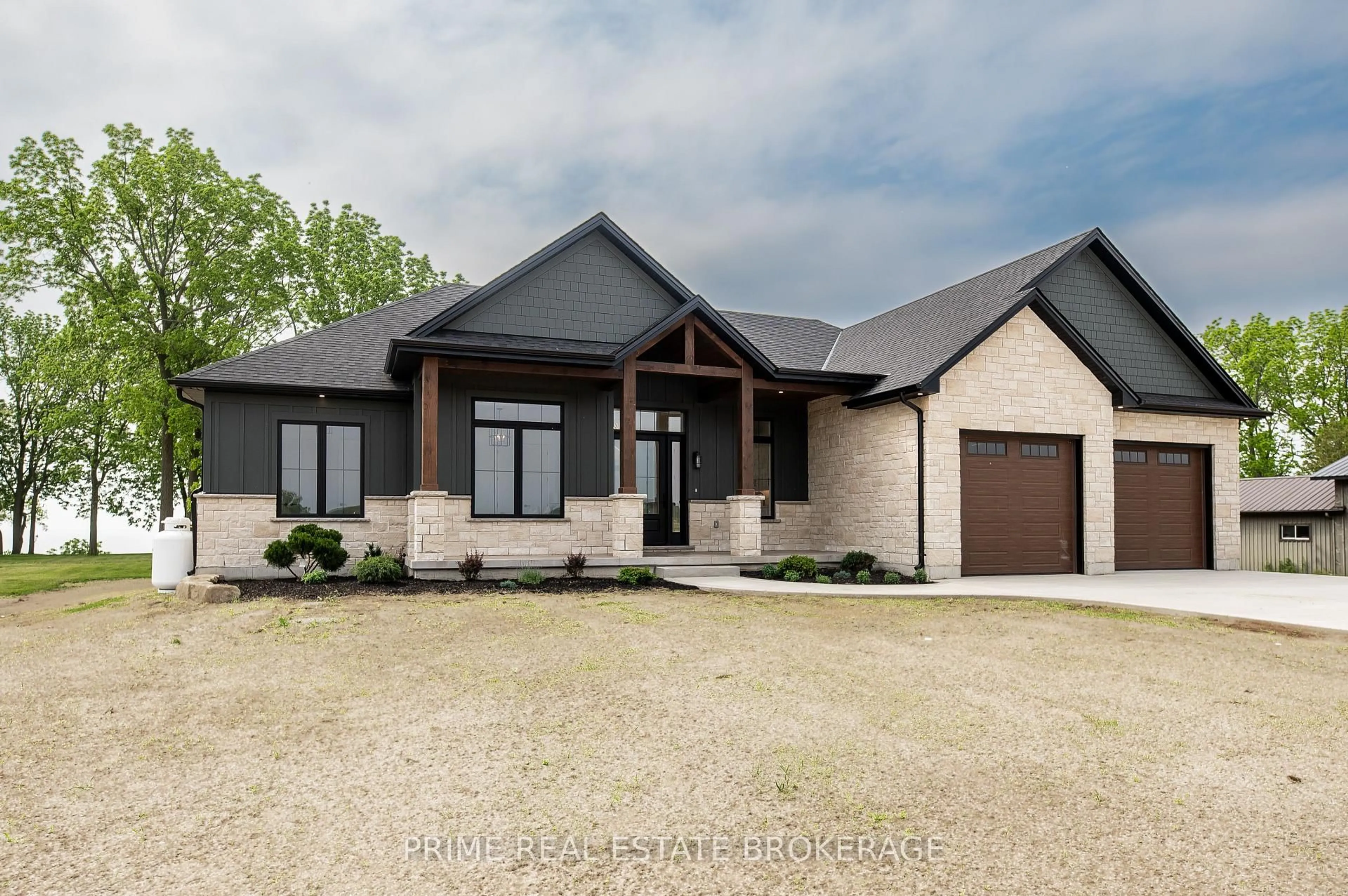 Home with brick exterior material, street for 25 Black Walnut Dr, Norfolk Ontario N0E 1P0