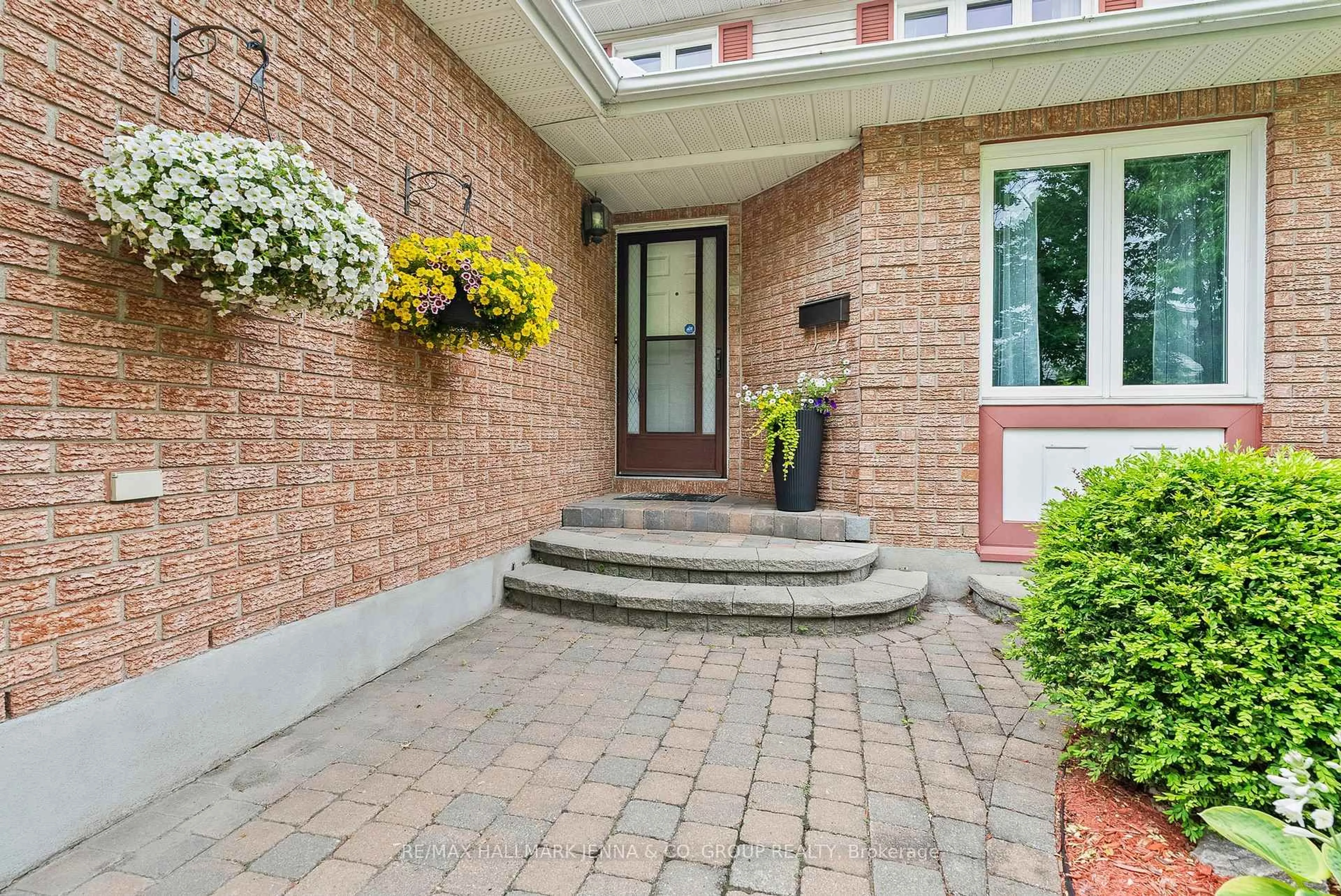 Home with brick exterior material, street for 70 Huntersfield Dr, Ottawa Ontario K1T 3L7