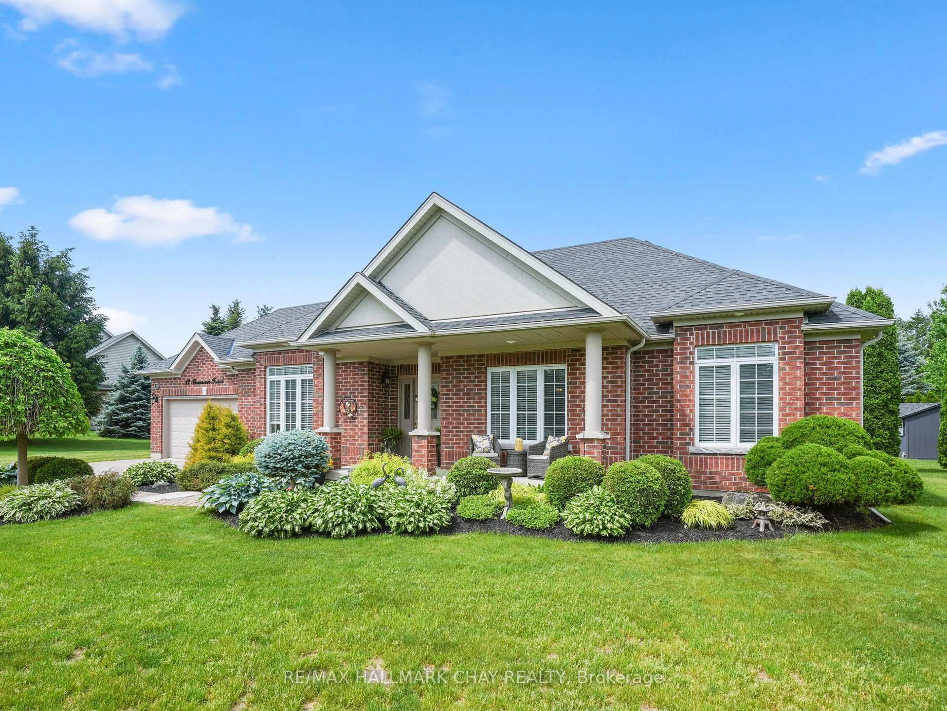 Home with brick exterior material, street for 12 Thomson Tr, Mulmur Ontario L9V 3J1
