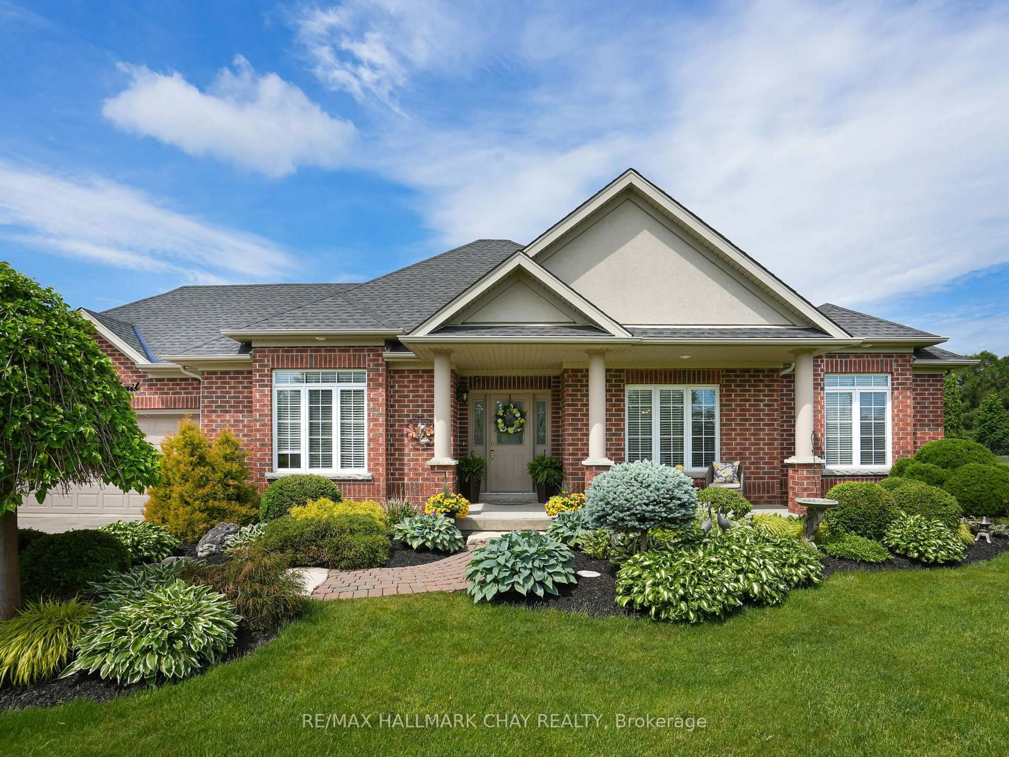 Home with brick exterior material, street for 12 Thomson Tr, Mulmur Ontario L9V 3J1