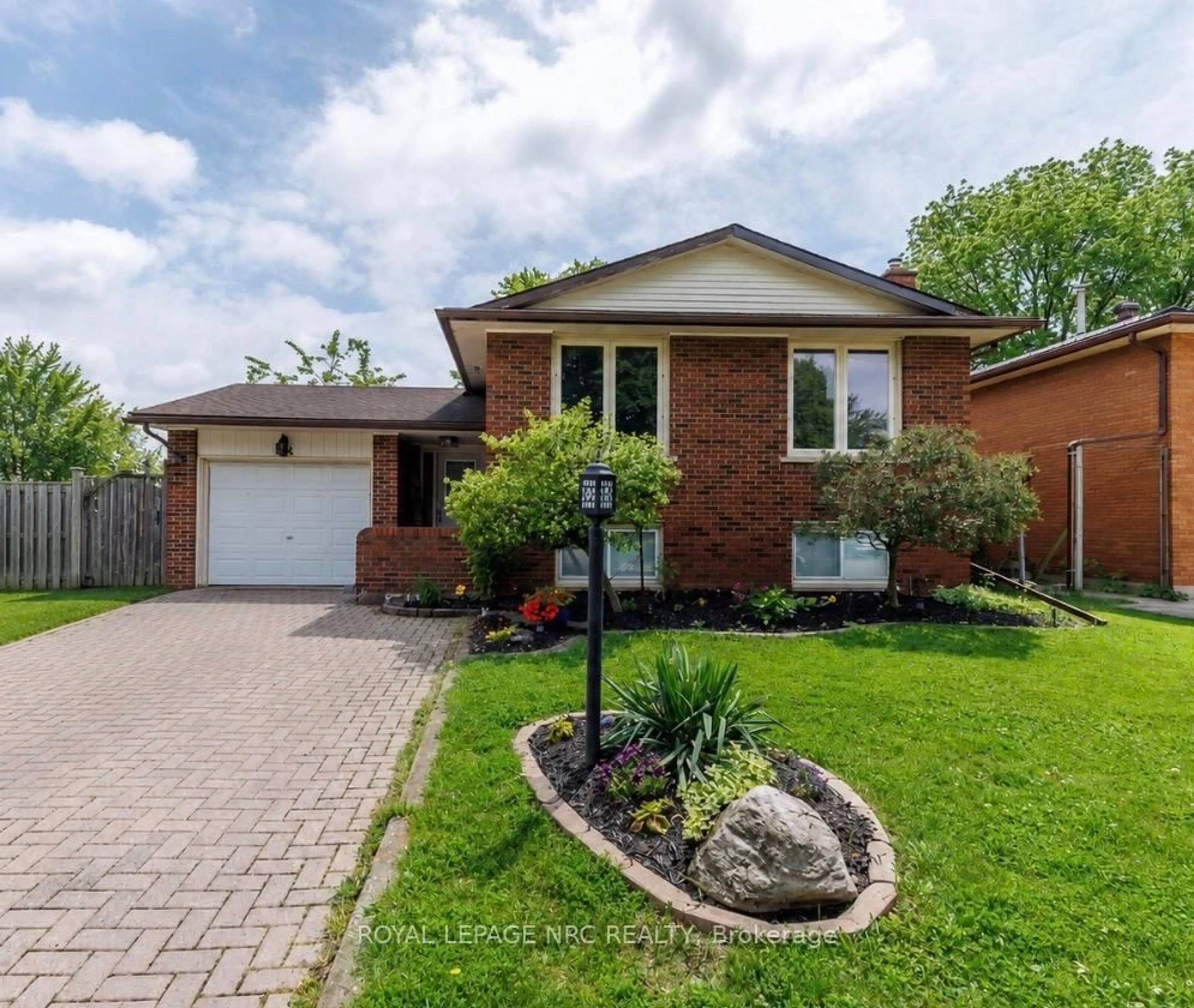 Home with brick exterior material, street for 14 BRIDLEWOOD Dr, Welland Ontario L3C 6N6