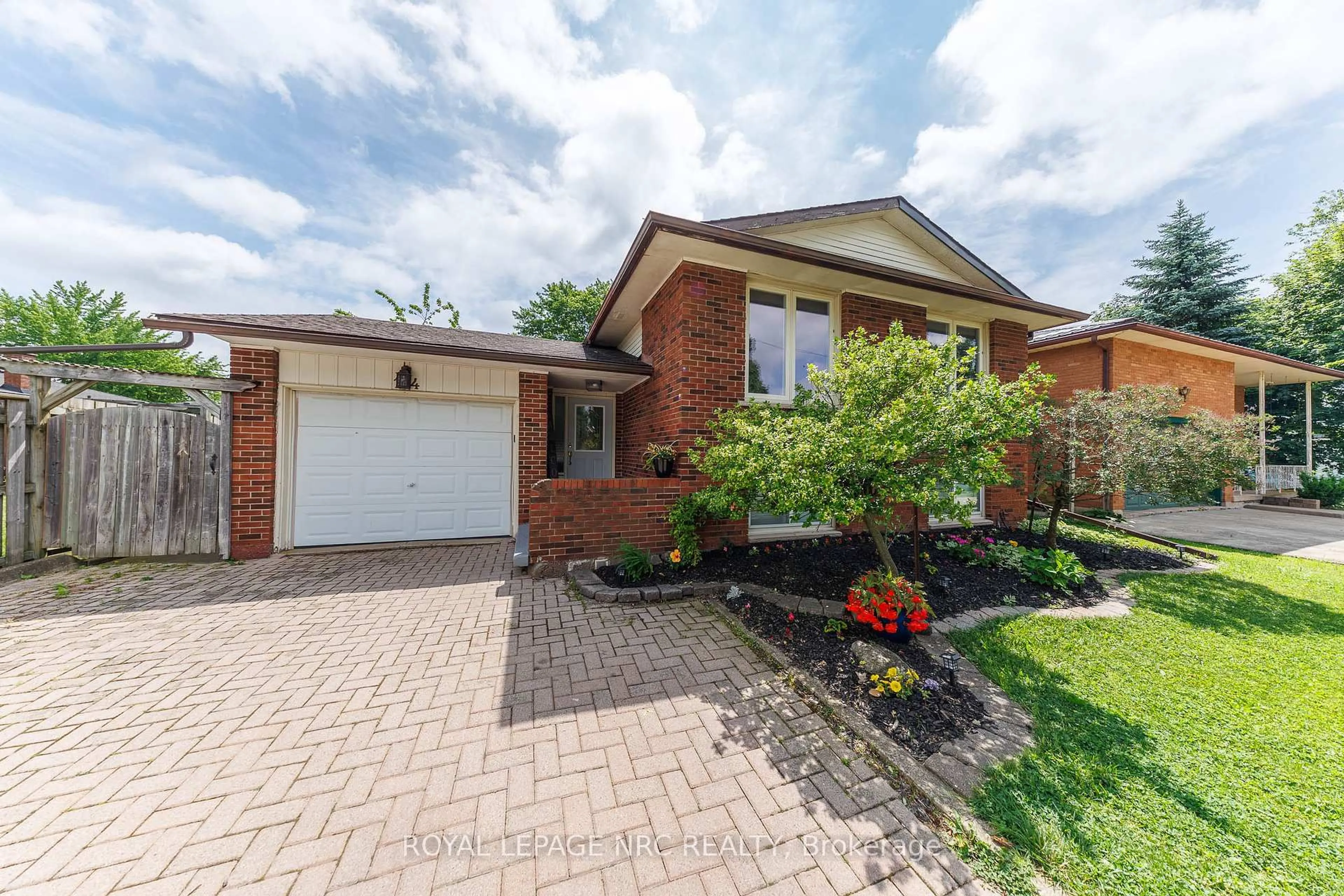 Home with brick exterior material, street for 14 BRIDLEWOOD Dr, Welland Ontario L3C 6N6