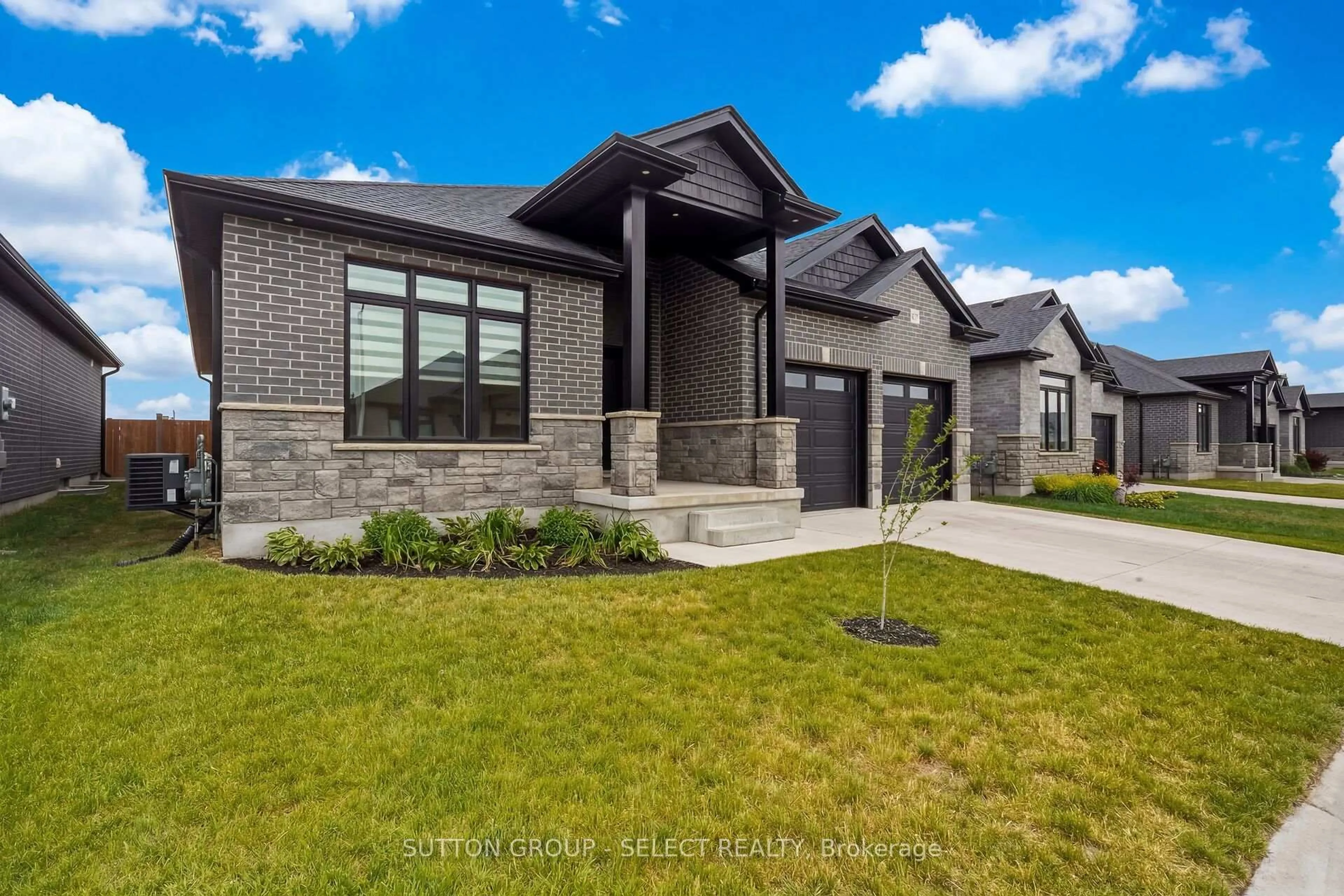 Home with brick exterior material, street for 383 DAVENTRY Way #45, Middlesex Centre Ontario N0L 1R0