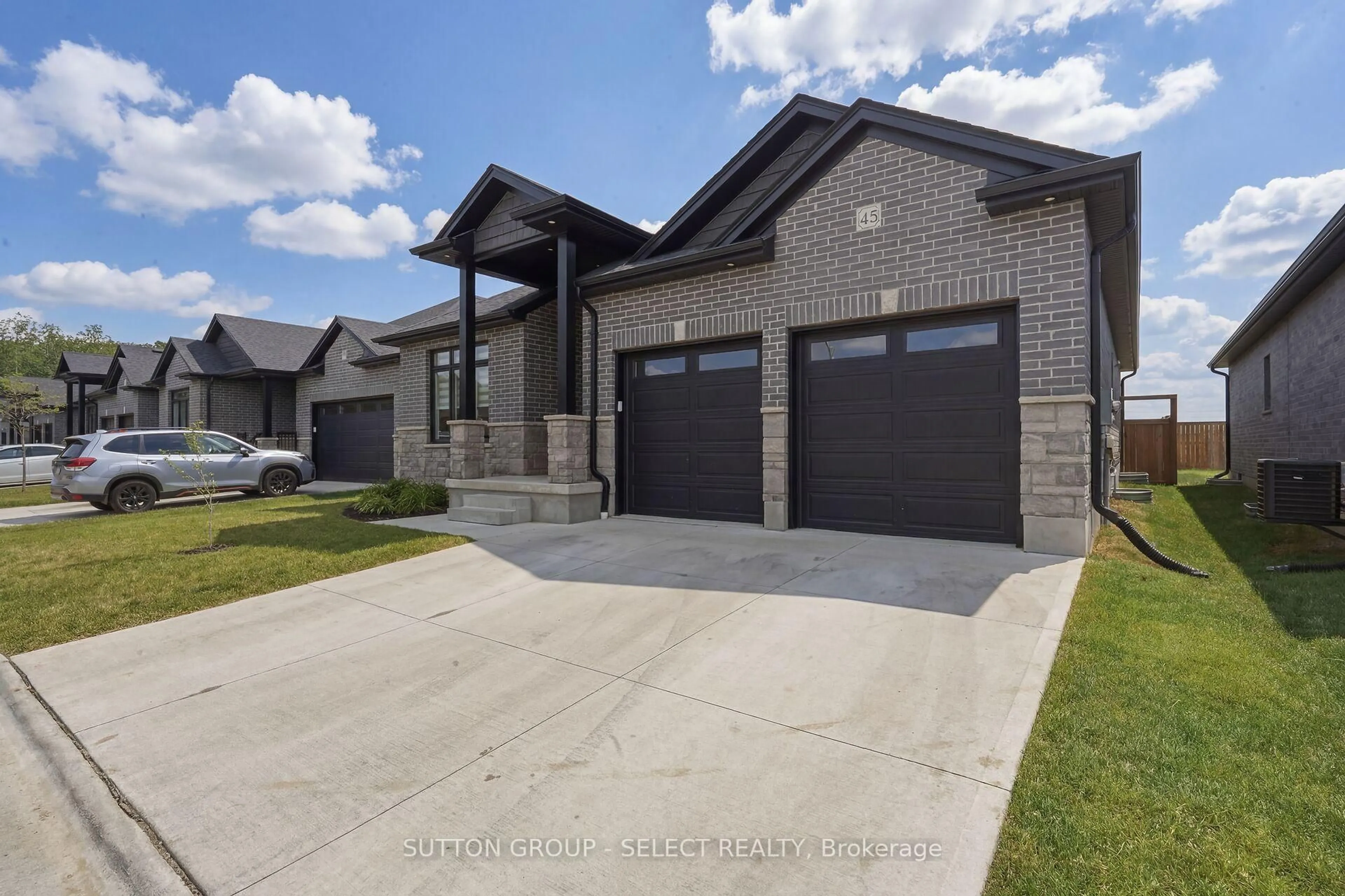 Home with brick exterior material, street for 383 DAVENTRY Way #45, Middlesex Centre Ontario N0L 1R0