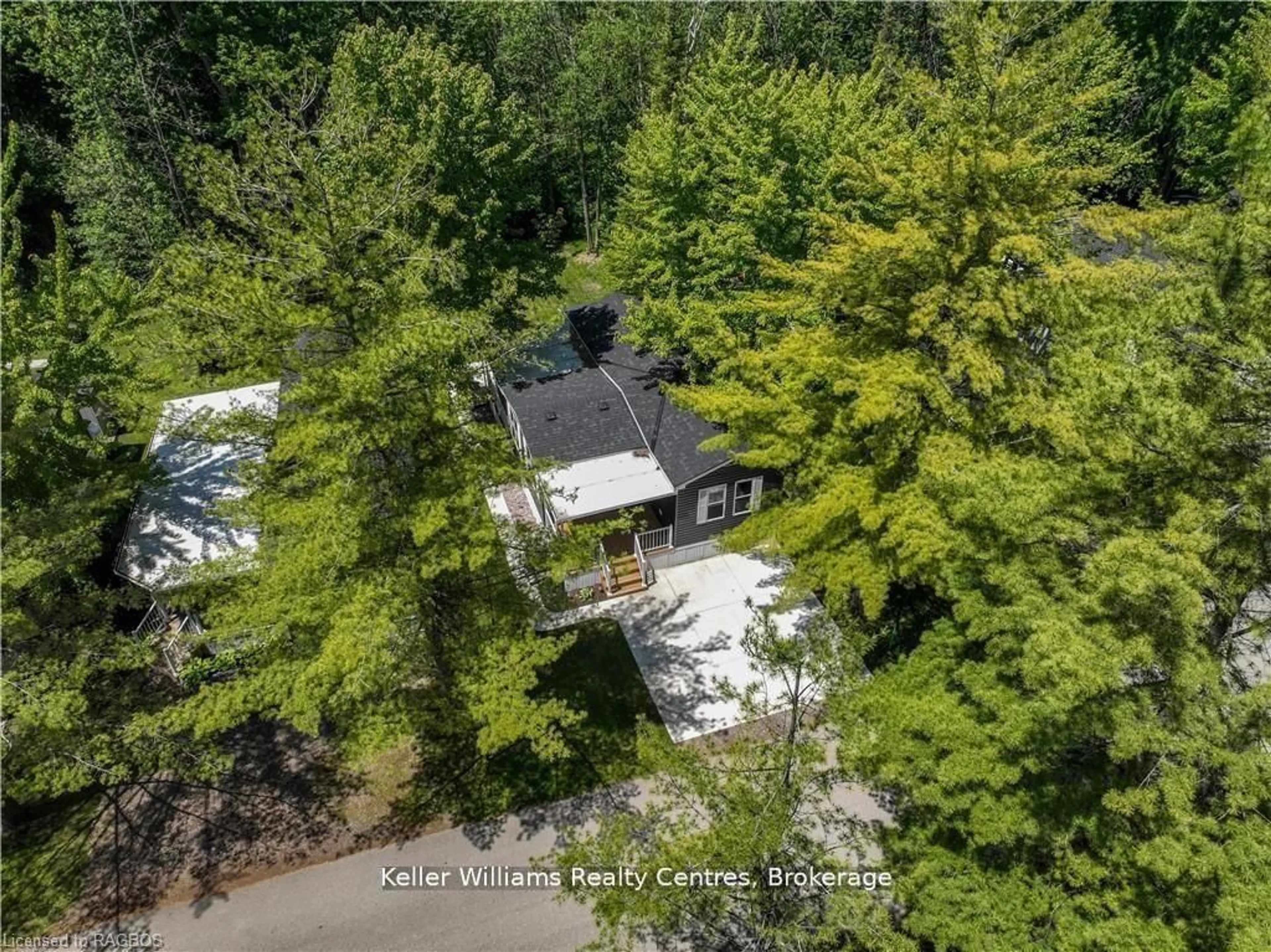 A pic from outside/outdoor area/front of a property/back of a property/a pic from drone, forest/trees view for 13 Southline Ave #157, Huron-Kinloss Ontario N2Z 2X5