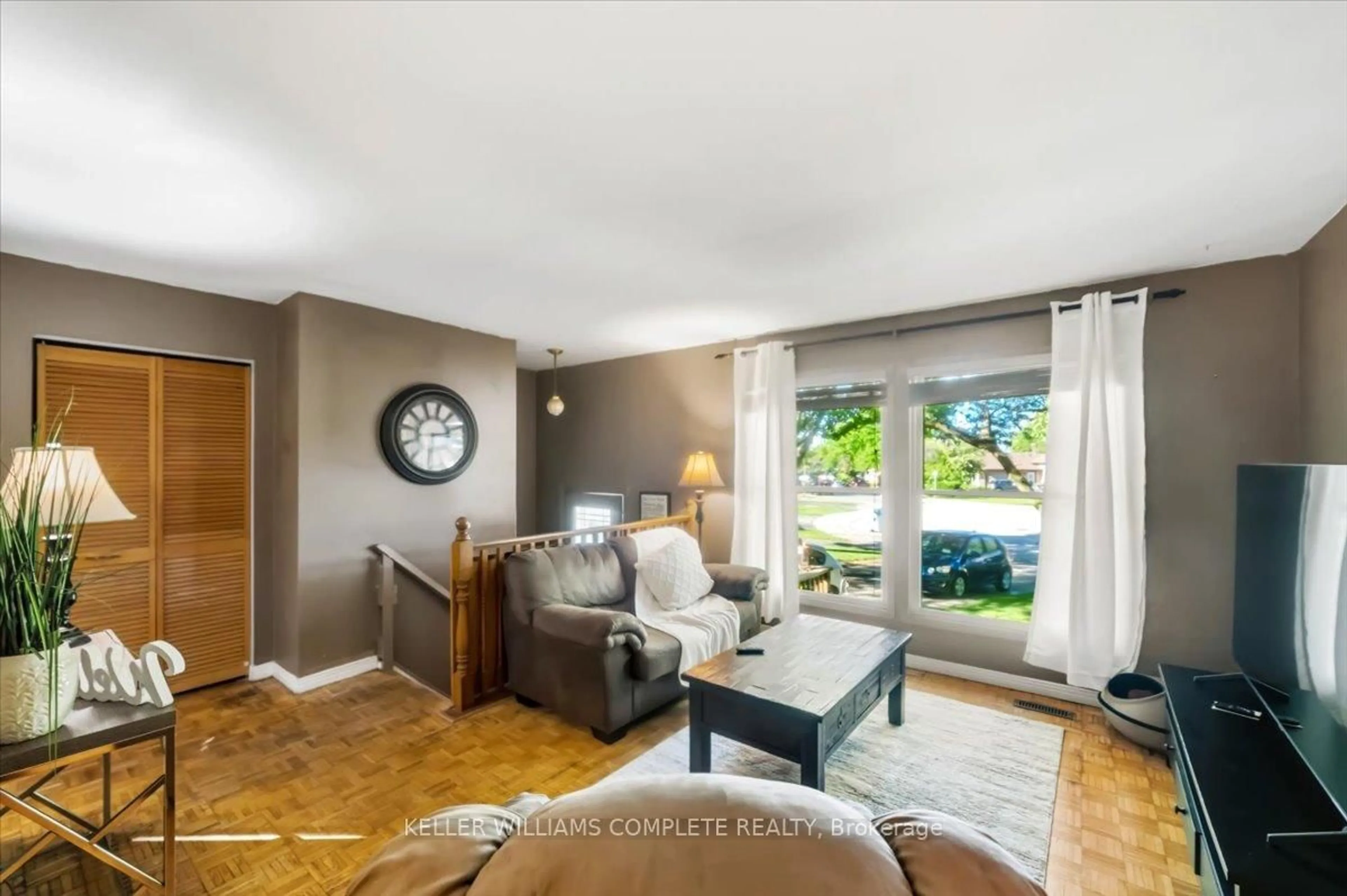 Living room with furniture, unknown for 228 Golden Orchard Dr, Hamilton Ontario L9C 6J7