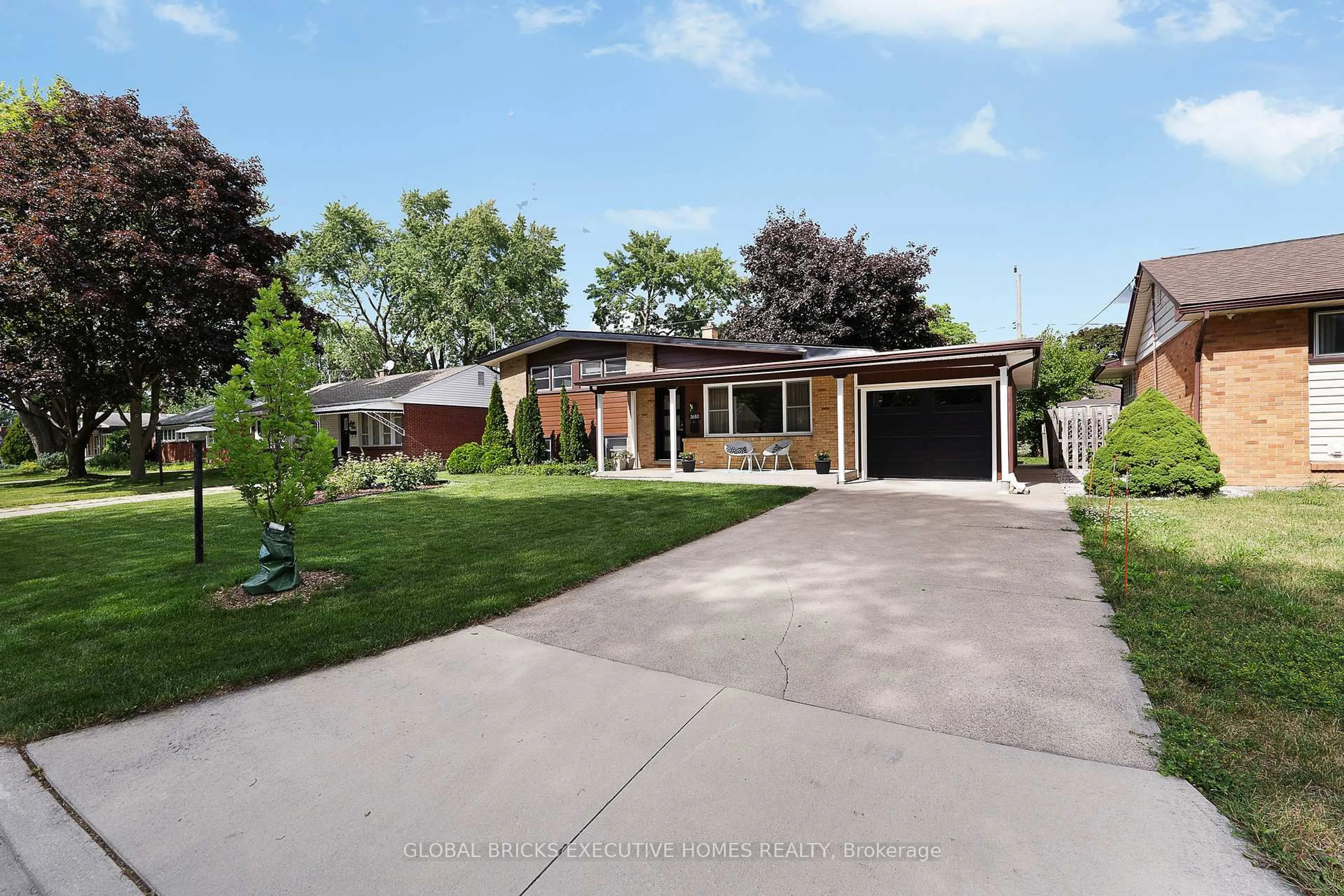 Home with brick exterior material, street for 3680 Roxborough Blvd, Windsor Ontario N9E 3A2