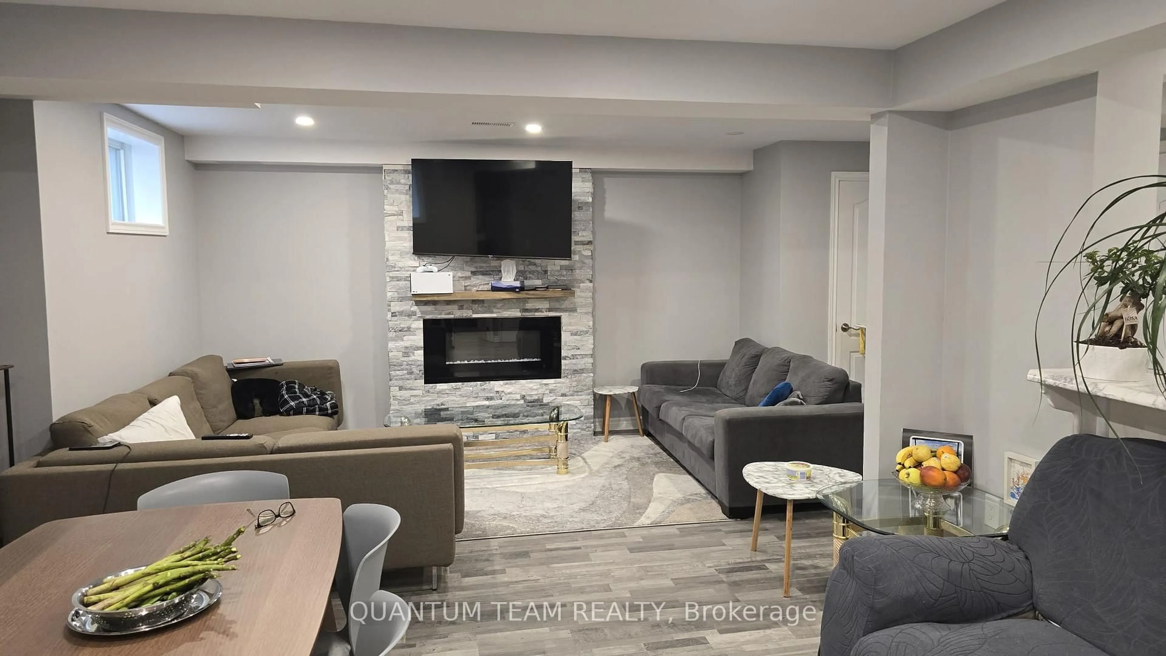 Living room with furniture, ceramic/tile floor for 8912 Forestview Blvd, Niagara Falls Ontario L2H 0C2