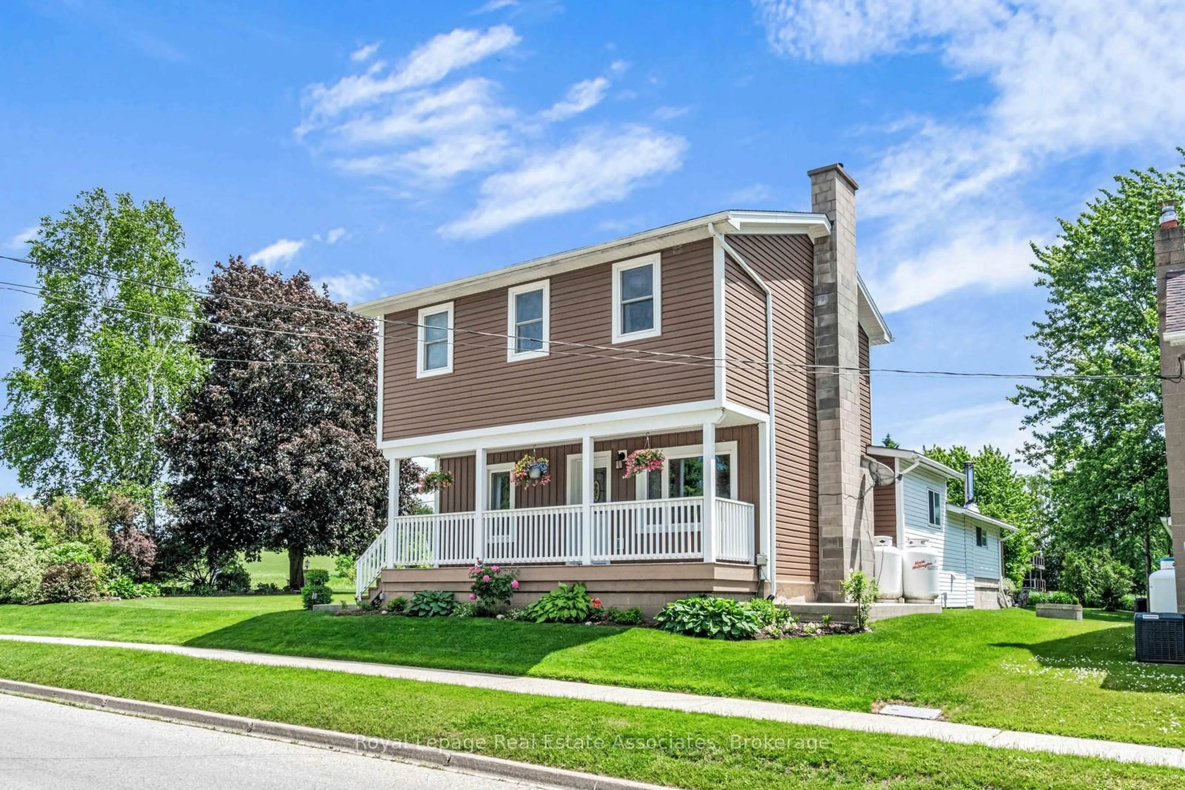 Home with vinyl exterior material, street for 117 Helena St, West Grey Ontario N0G 1C0