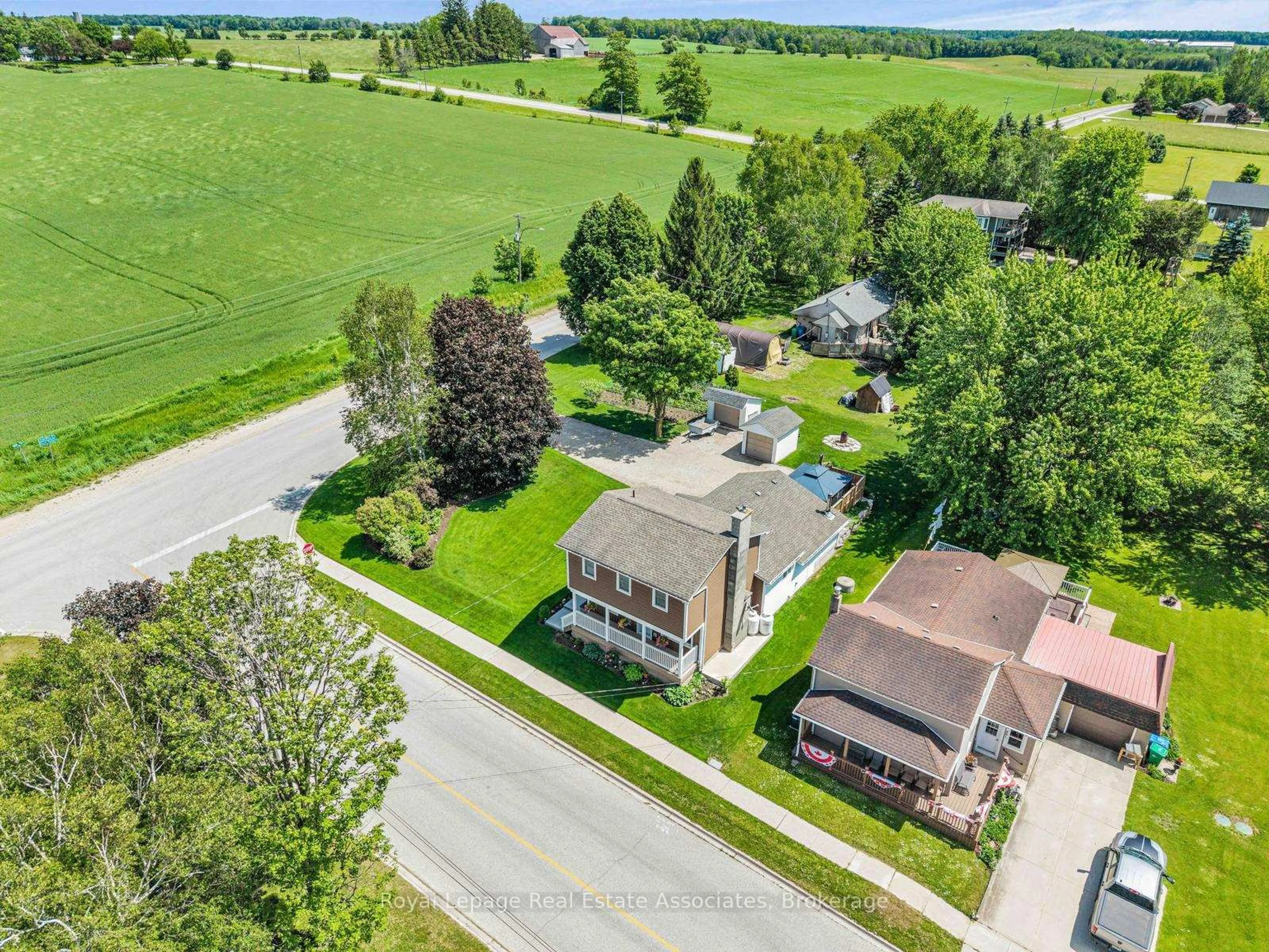 A pic from outside/outdoor area/front of a property/back of a property/a pic from drone, street for 117 Helena St, West Grey Ontario N0G 1C0