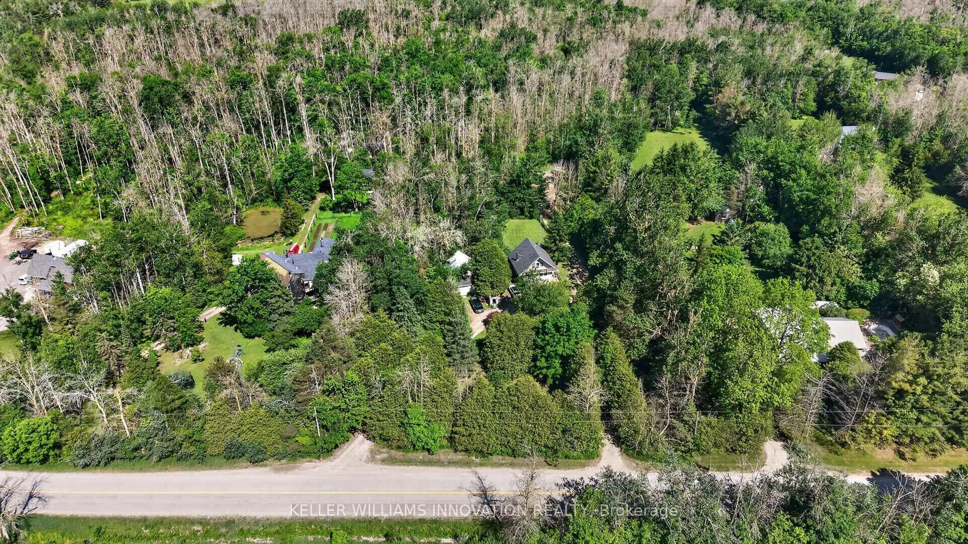 A pic from outside/outdoor area/front of a property/back of a property/a pic from drone, forest/trees view for 7858 Sideroad 21, Centre Wellington Ontario N0G 1A0