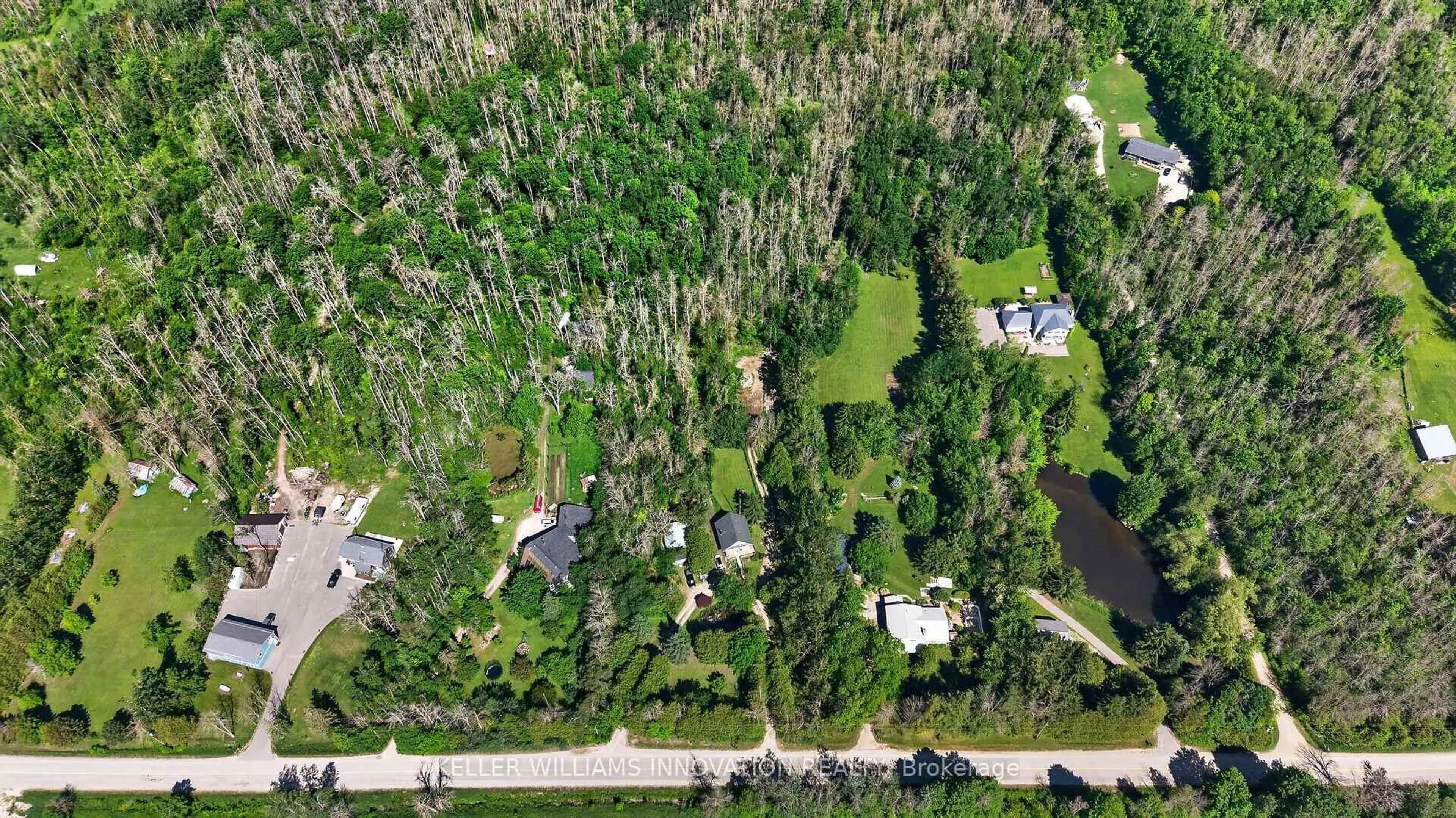 A pic from outside/outdoor area/front of a property/back of a property/a pic from drone, forest/trees view for 7858 Sideroad 21, Centre Wellington Ontario N0G 1A0