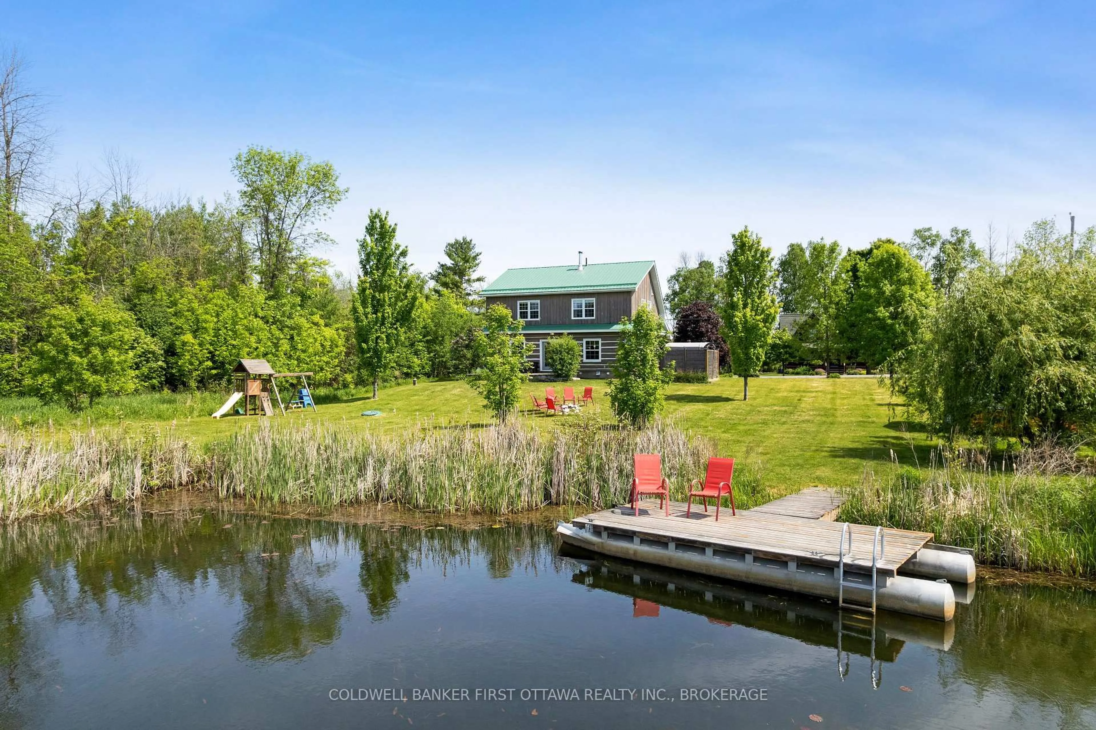 A pic from outside/outdoor area/front of a property/back of a property/a pic from drone, water/lake/river/ocean view for 317 Coutts Bay Rd, Perth Ontario K7H 3C7