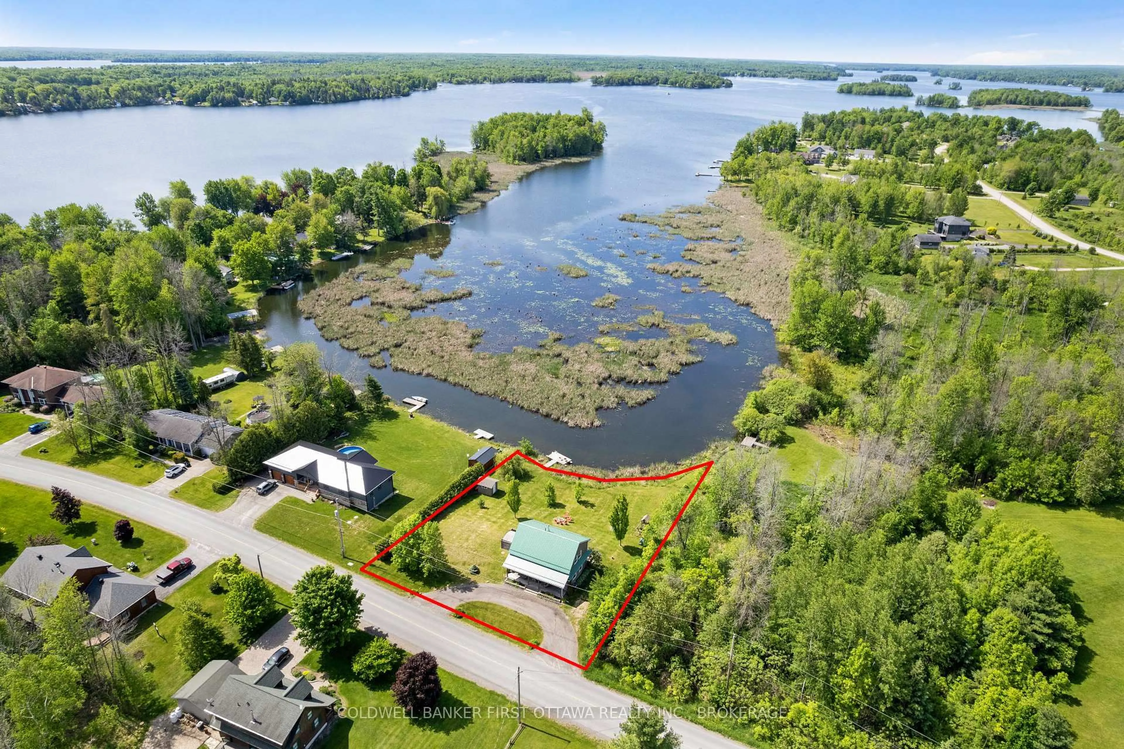 A pic from outside/outdoor area/front of a property/back of a property/a pic from drone, water/lake/river/ocean view for 317 Coutts Bay Rd, Perth Ontario K7H 3C7