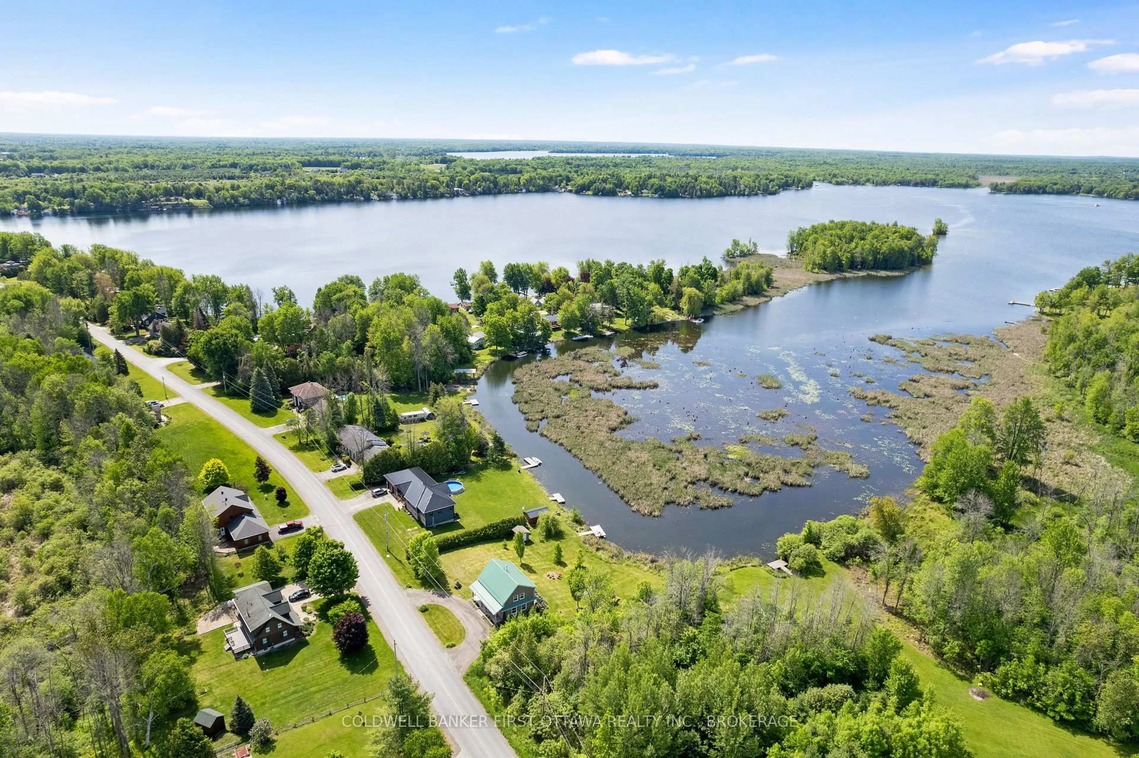 A pic from outside/outdoor area/front of a property/back of a property/a pic from drone, water/lake/river/ocean view for 317 Coutts Bay Rd, Perth Ontario K7H 3C7