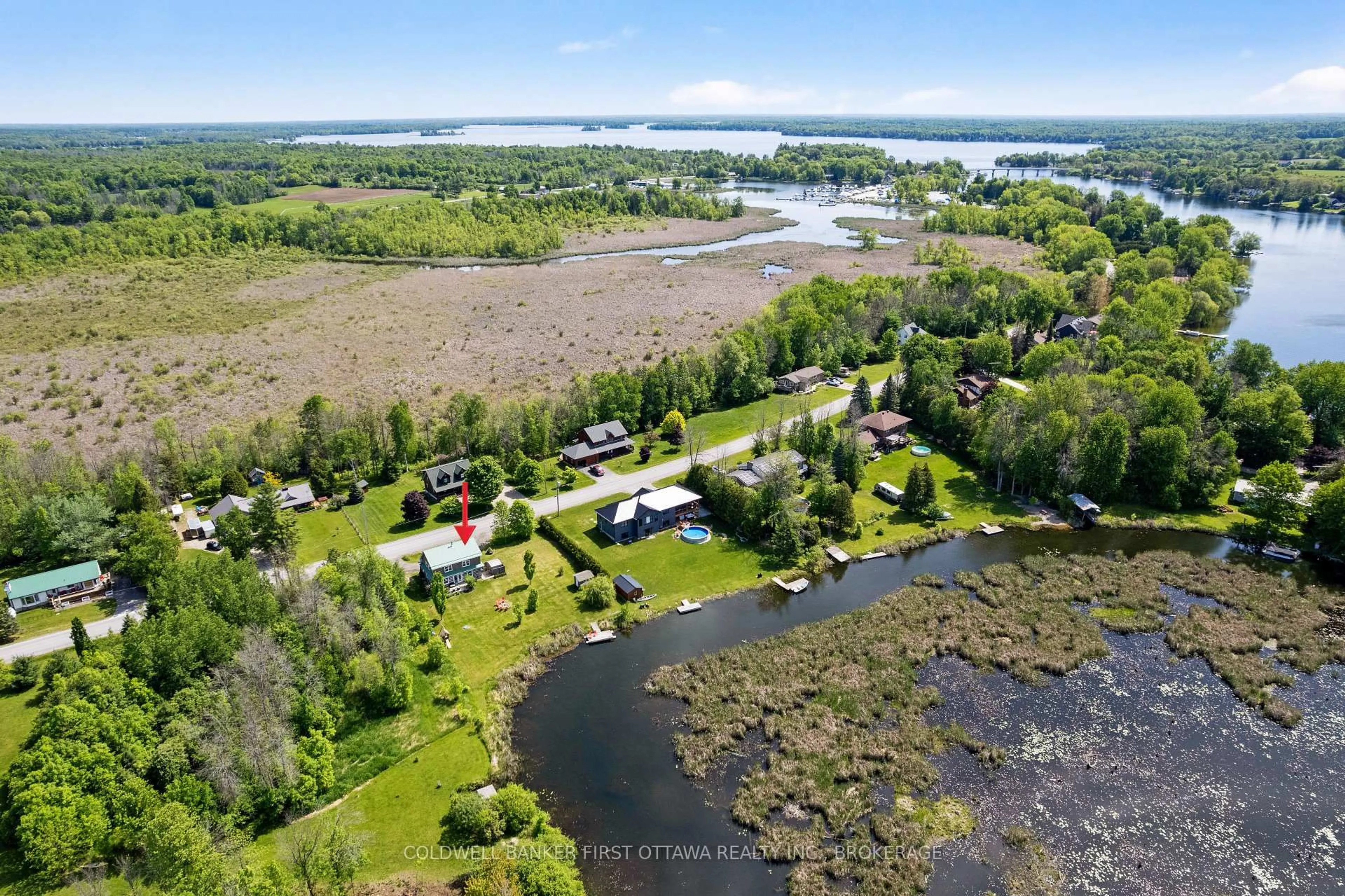 A pic from outside/outdoor area/front of a property/back of a property/a pic from drone, water/lake/river/ocean view for 317 Coutts Bay Rd, Perth Ontario K7H 3C7