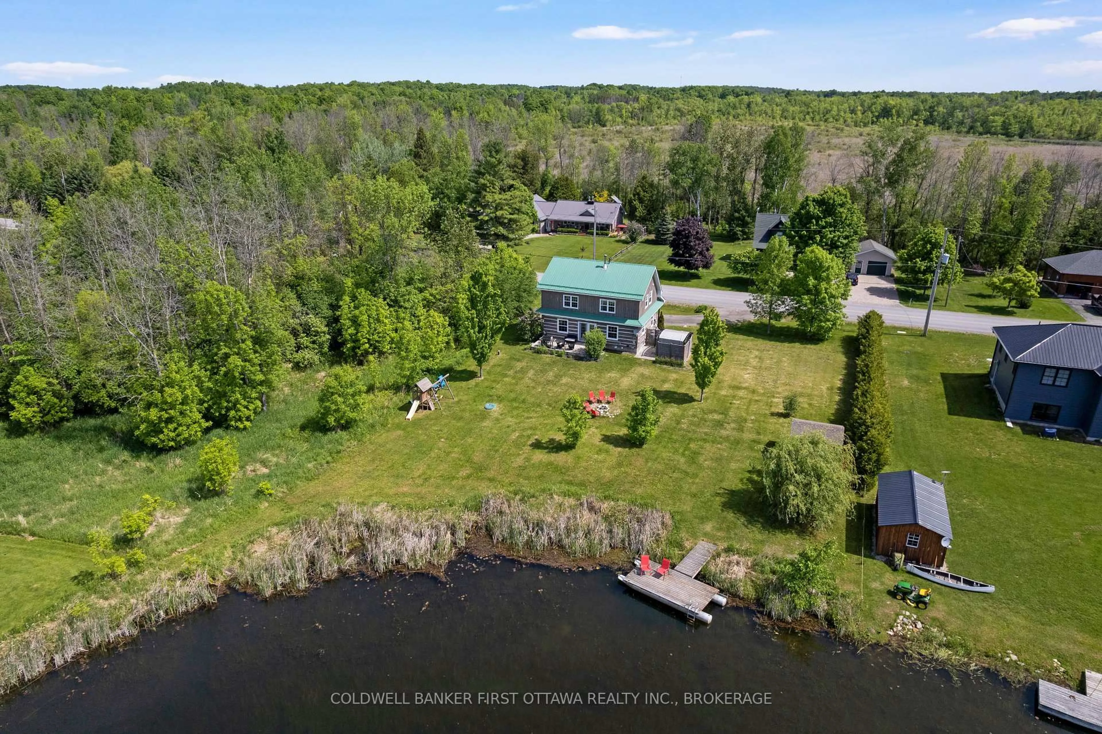 A pic from outside/outdoor area/front of a property/back of a property/a pic from drone, water/lake/river/ocean view for 317 Coutts Bay Rd, Perth Ontario K7H 3C7