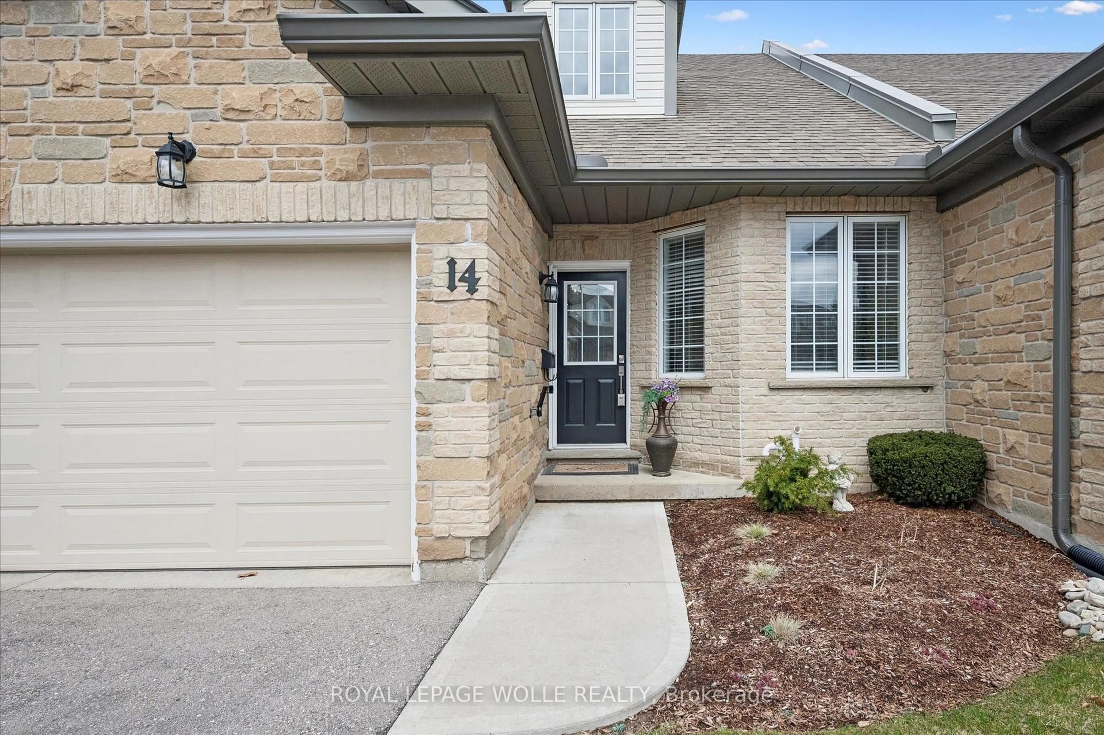 Home with brick exterior material, street for 180 Old Abbey Rd #14, Waterloo Ontario N2K 4B2