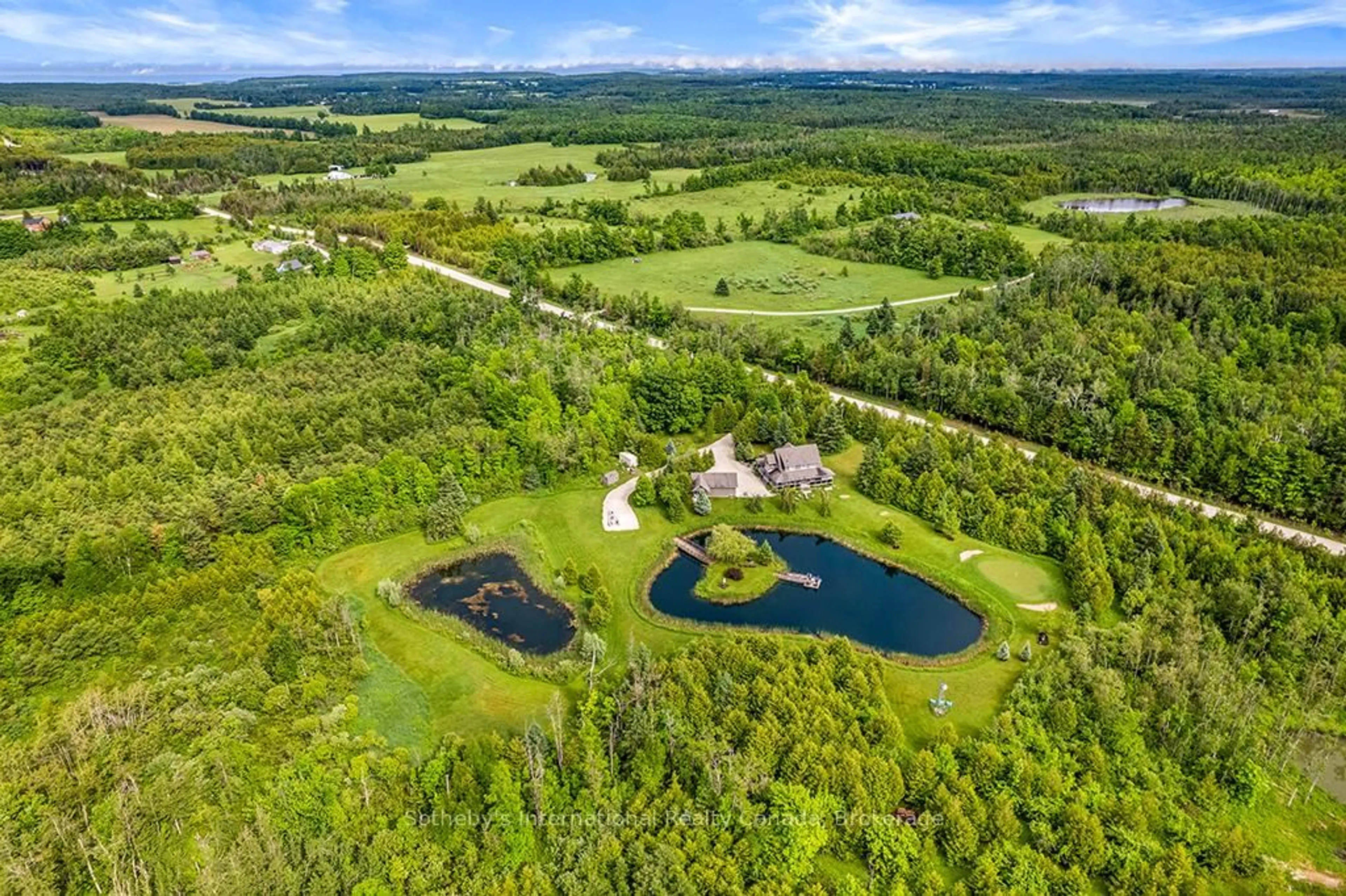 A pic from outside/outdoor area/front of a property/back of a property/a pic from drone, water/lake/river/ocean view for 429573 8TH CONCESSION B Line, Grey Highlands Ontario N0C 1M0