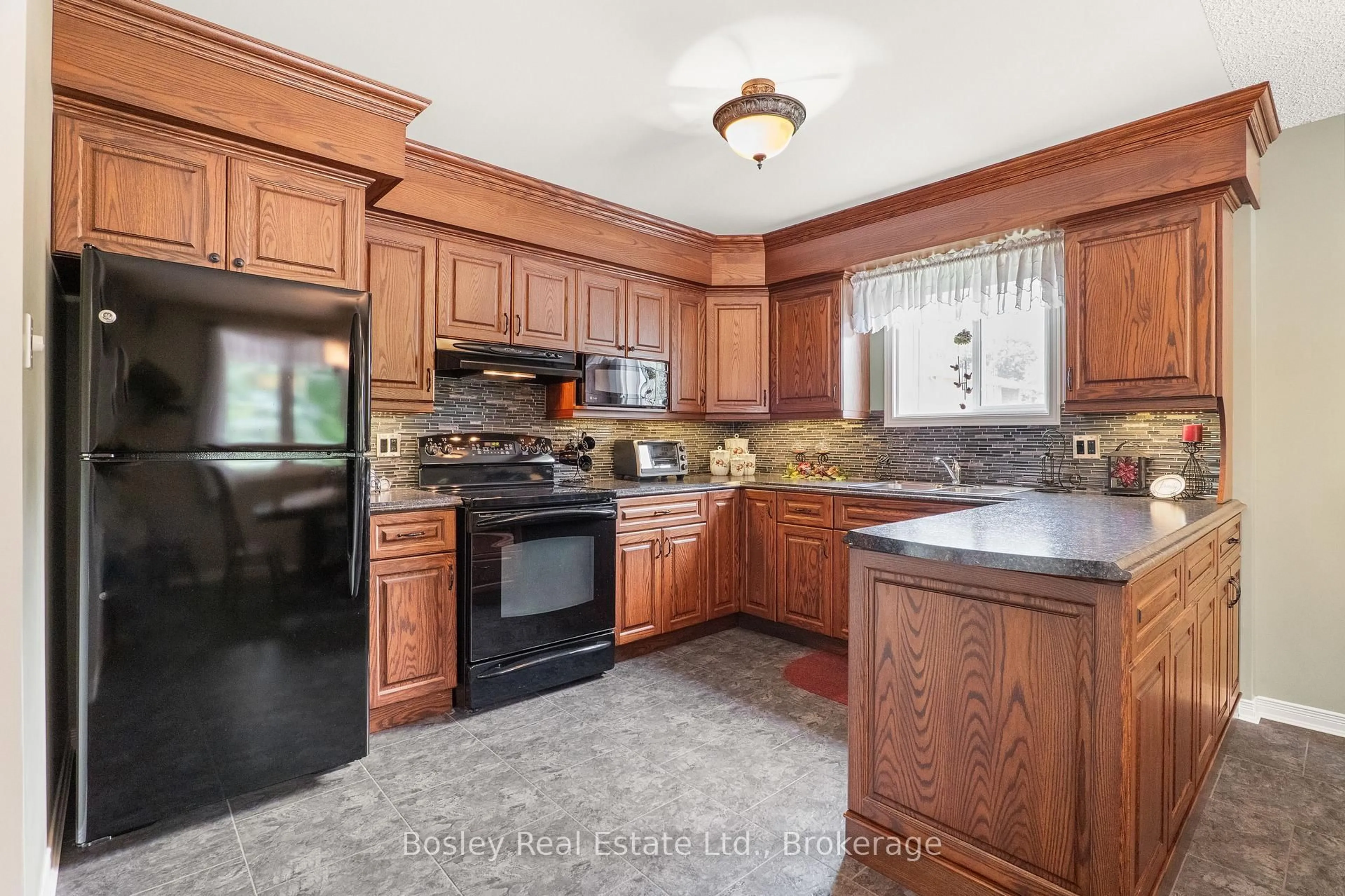 Standard kitchen, ceramic/tile floor for 440 Durham St #203, Wellington North Ontario N0G 2L1
