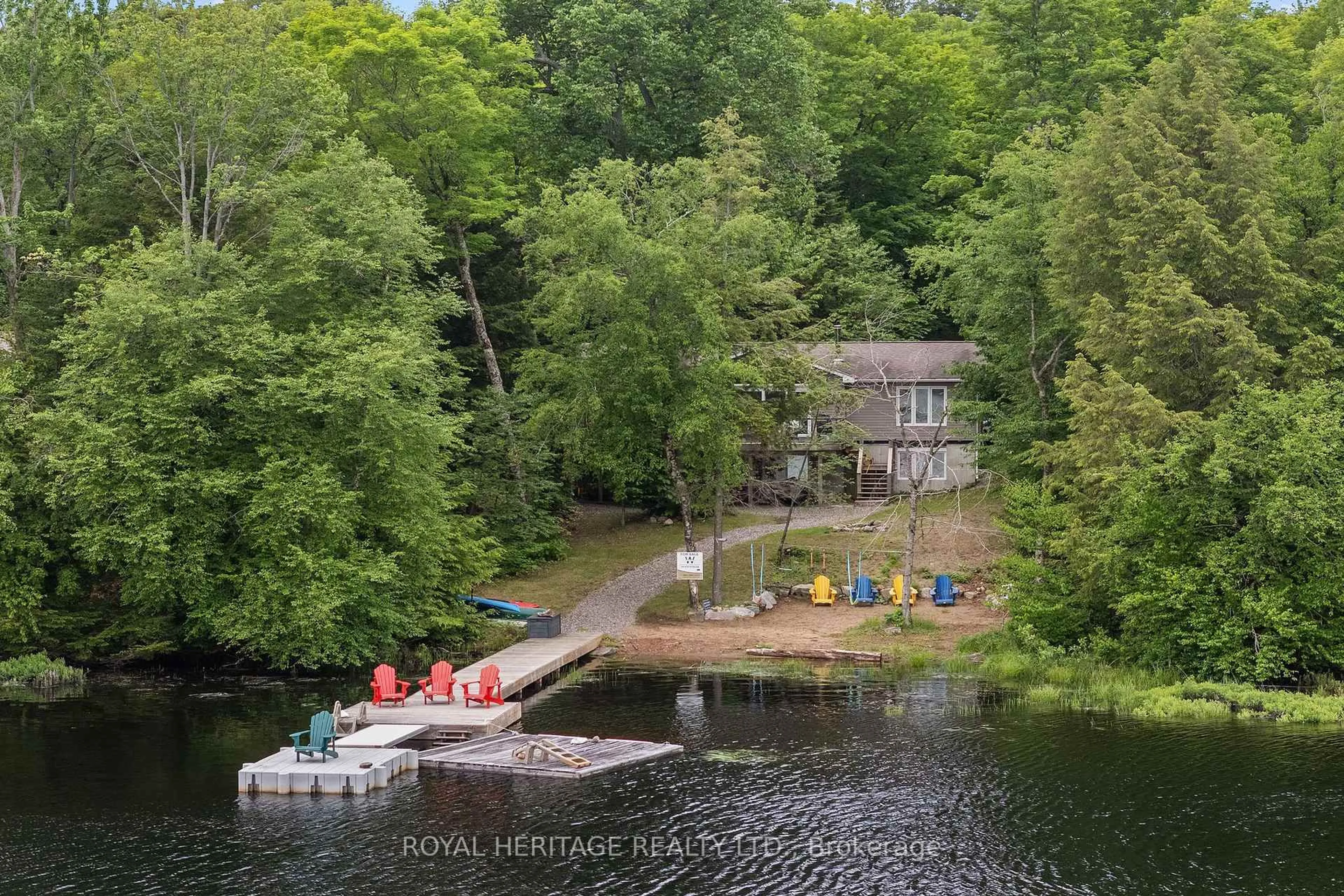 A pic from outside/outdoor area/front of a property/back of a property/a pic from drone, water/lake/river/ocean view for 1160 Minnow Dr, Dysart et al Ontario K0M 1S0