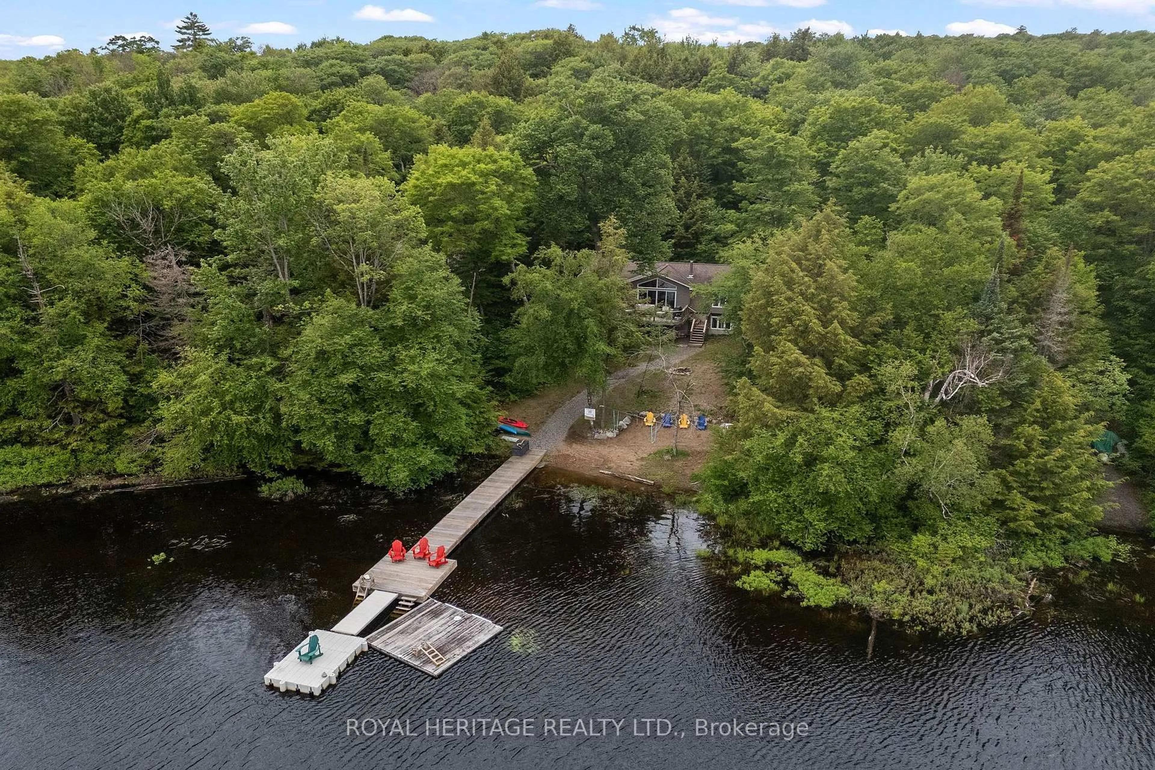 A pic from outside/outdoor area/front of a property/back of a property/a pic from drone, water/lake/river/ocean view for 1160 Minnow Dr, Dysart et al Ontario K0M 1S0