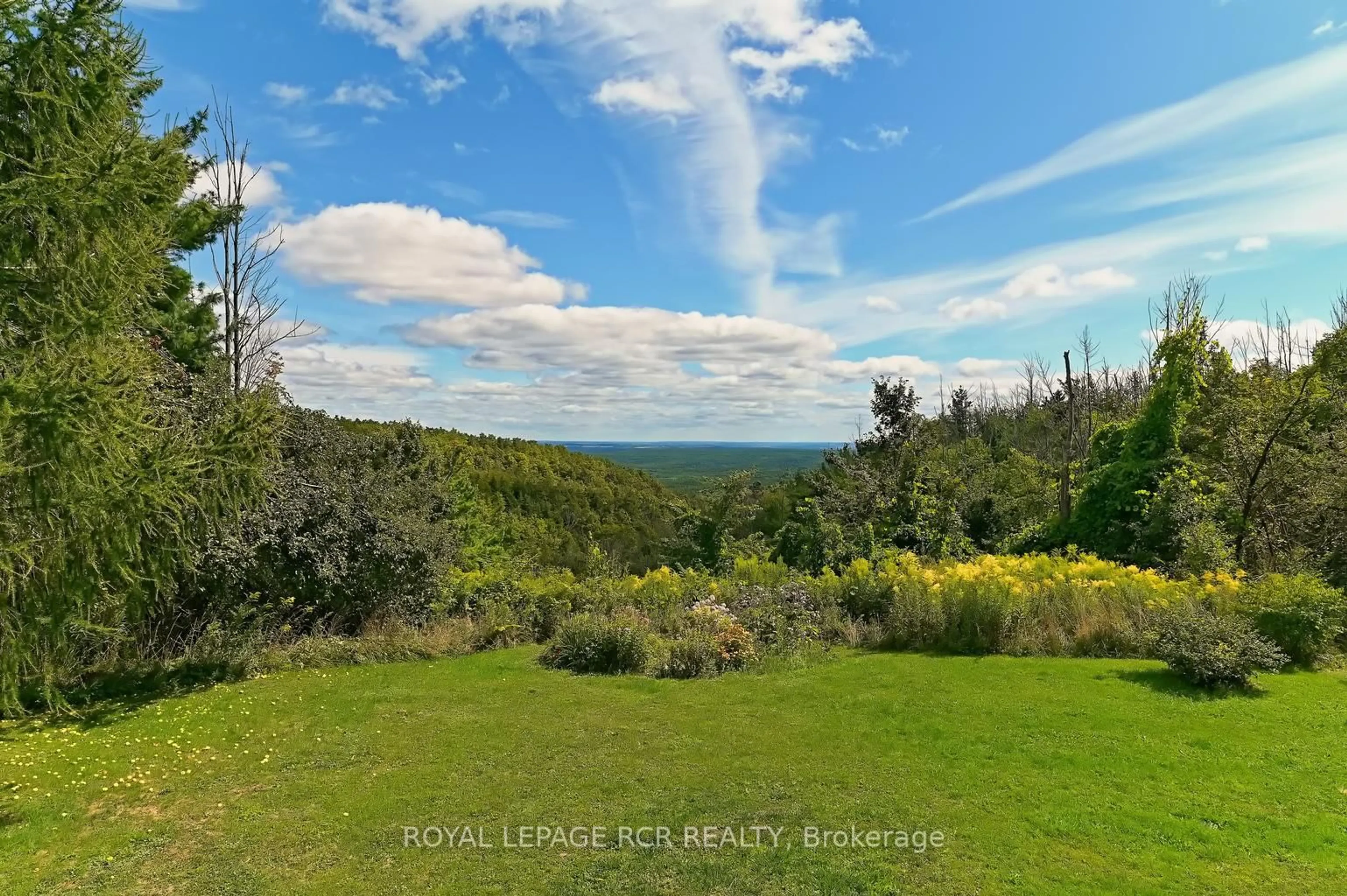 A pic from outside/outdoor area/front of a property/back of a property/a pic from drone, water/lake/river/ocean view for 798433 3rd Line, Mulmur Ontario L9V 0H8