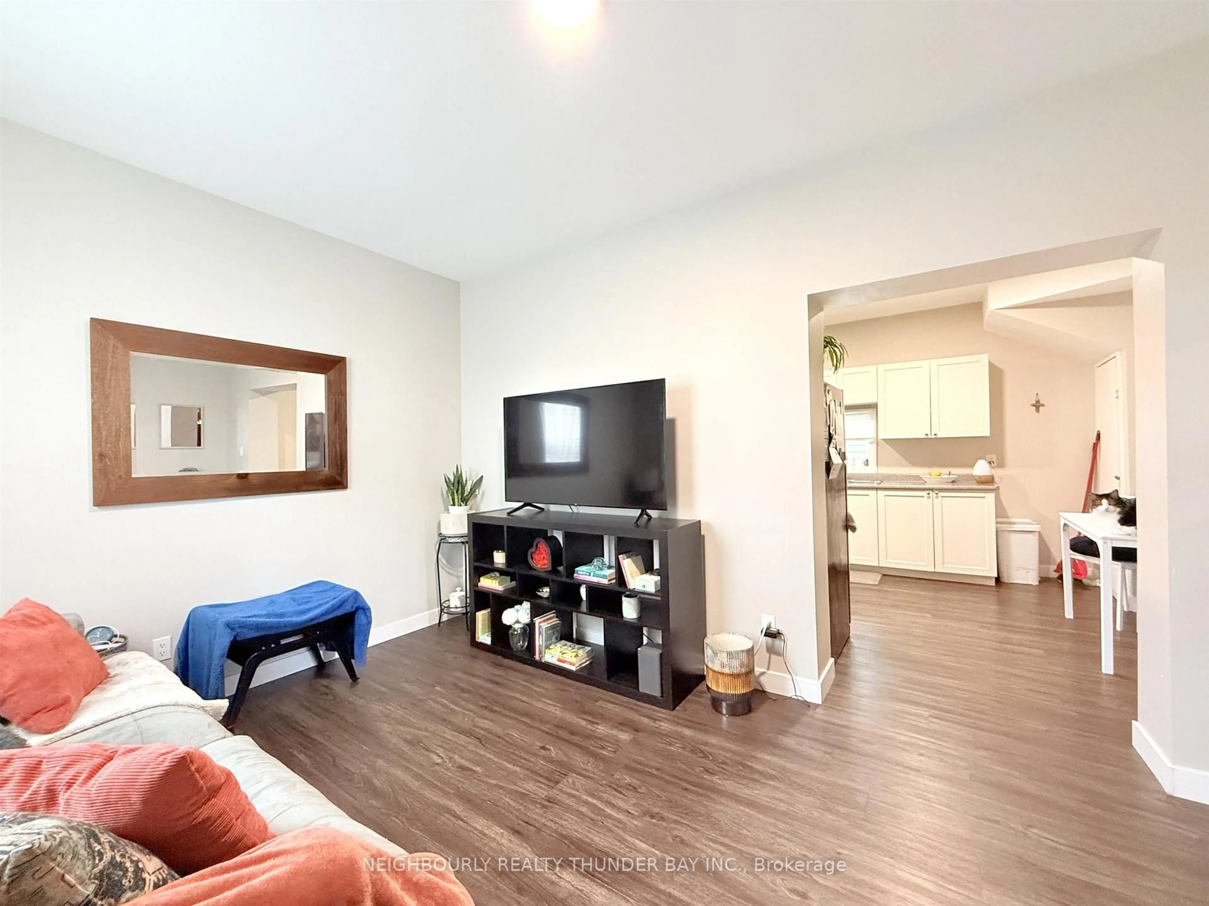 Living room with furniture, wood/laminate floor for 205 Marks St, Thunder Bay Ontario P7C 4E9
