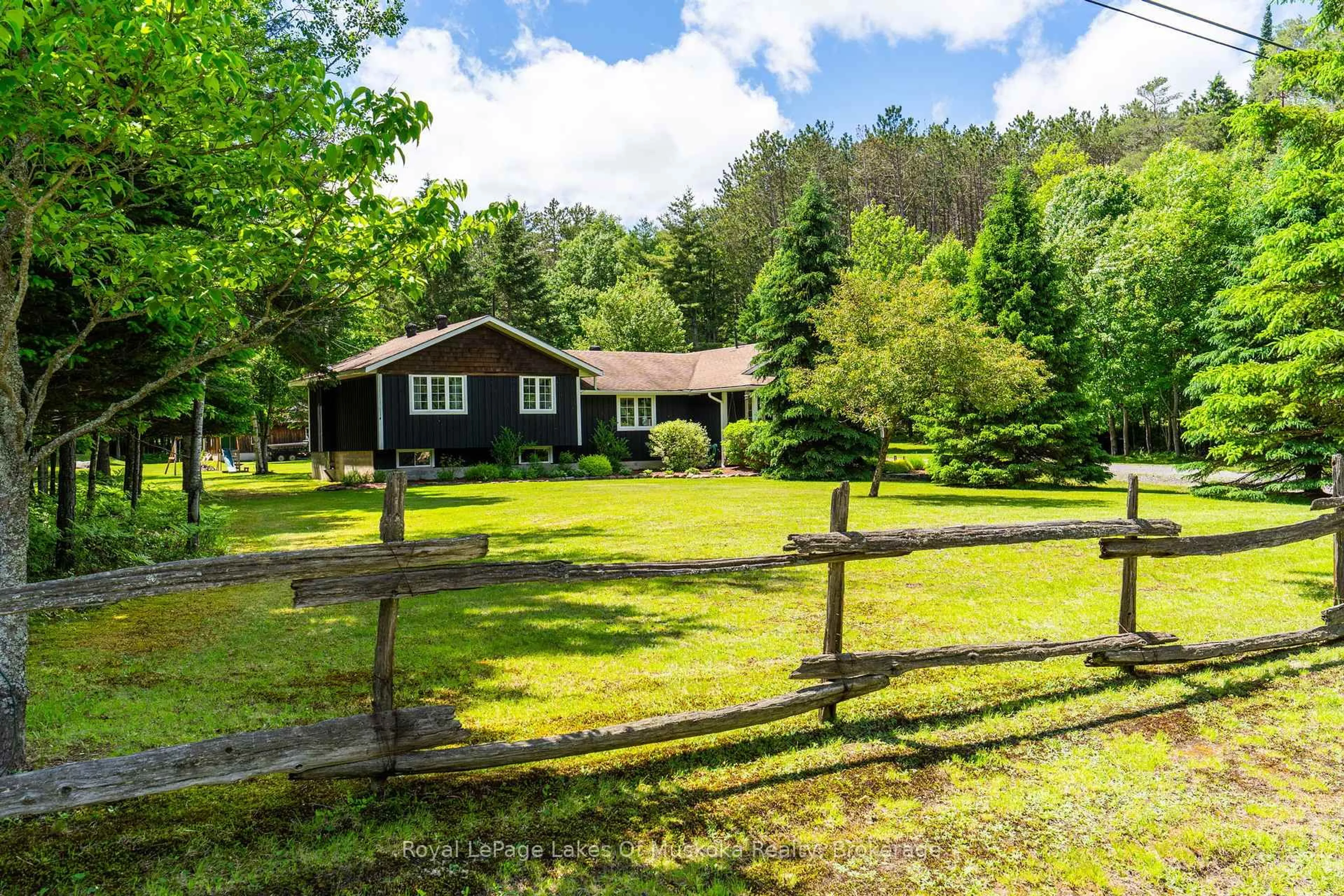 A pic from outside/outdoor area/front of a property/back of a property/a pic from drone, unknown for 764 Fowlers Rd, Huntsville Ontario P1H 2N5
