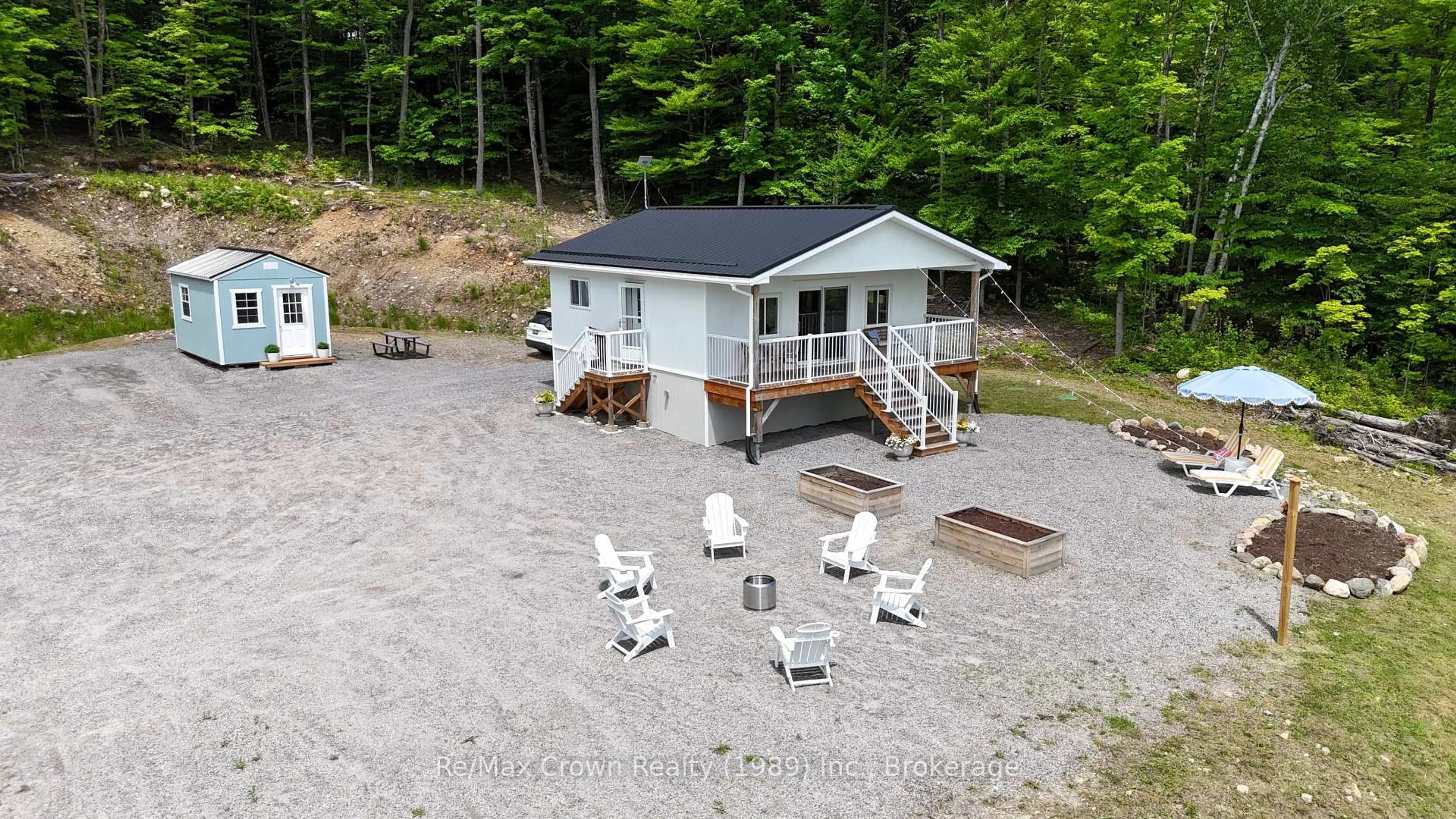 A pic from outside/outdoor area/front of a property/back of a property/a pic from drone, water/lake/river/ocean view for 1052 Limberlost Point Rd, Parry Sound Remote Area Ontario P0H 2R0