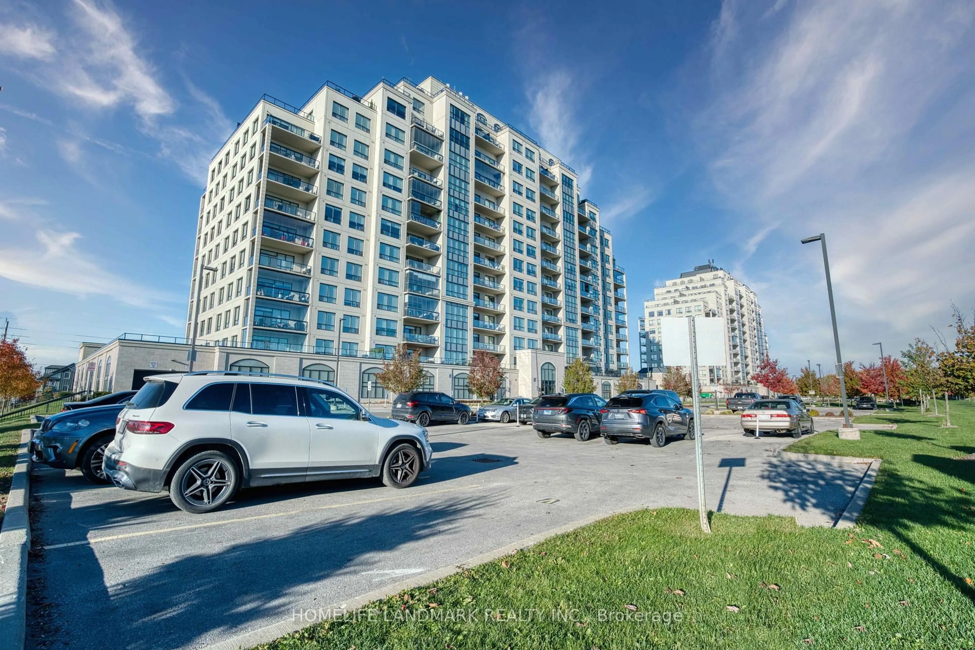 A pic from outside/outdoor area/front of a property/back of a property/a pic from drone, street for 260 VILLAGEWALK Blvd #313, London North Ontario N6G 0W6