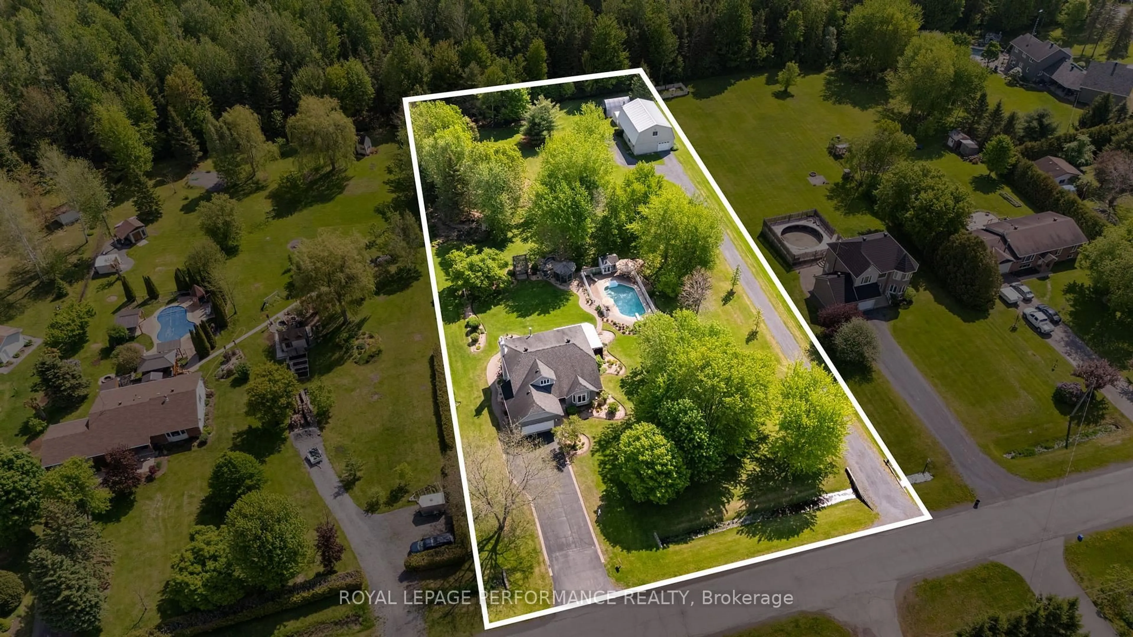 A pic from outside/outdoor area/front of a property/back of a property/a pic from drone, street for 882 Du Castor Rd, The Nation Ontario K0A 3C0