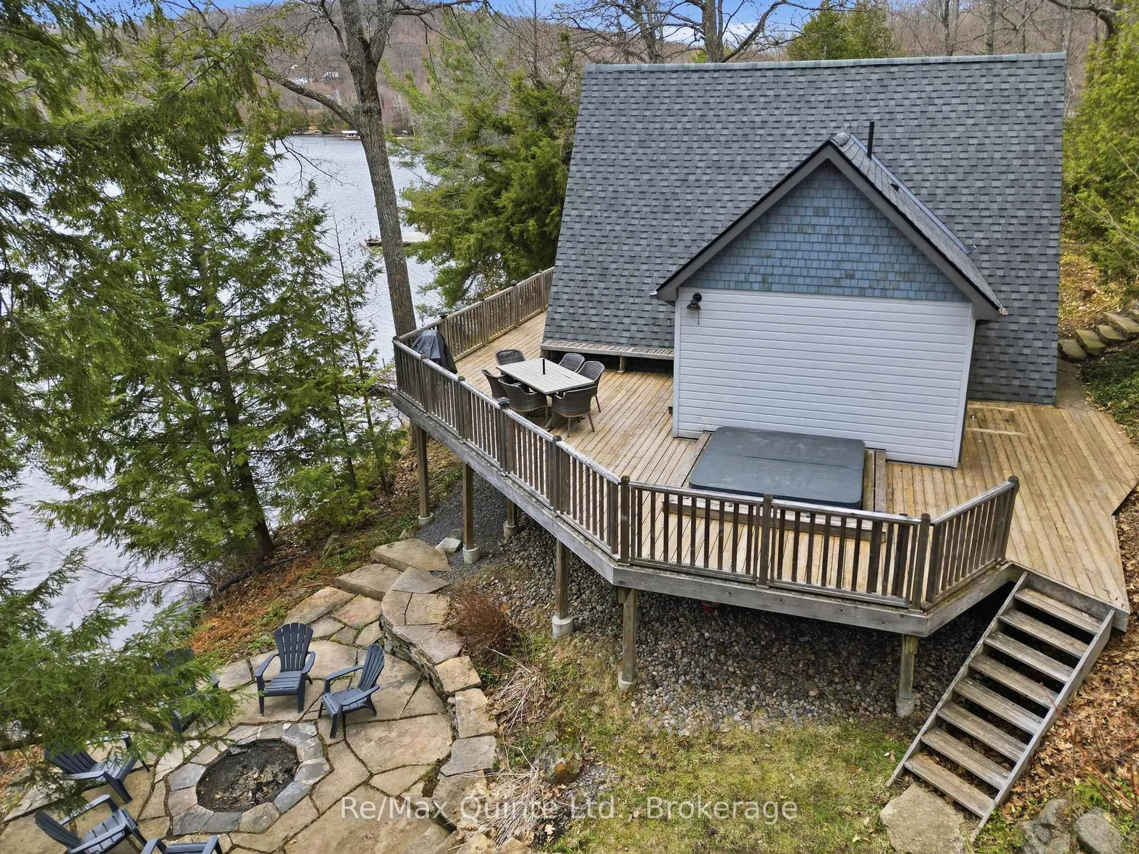 A pic from outside/outdoor area/front of a property/back of a property/a pic from drone, water/lake/river/ocean view for 203 Faradale Dr, Bancroft Ontario K0L 1C0