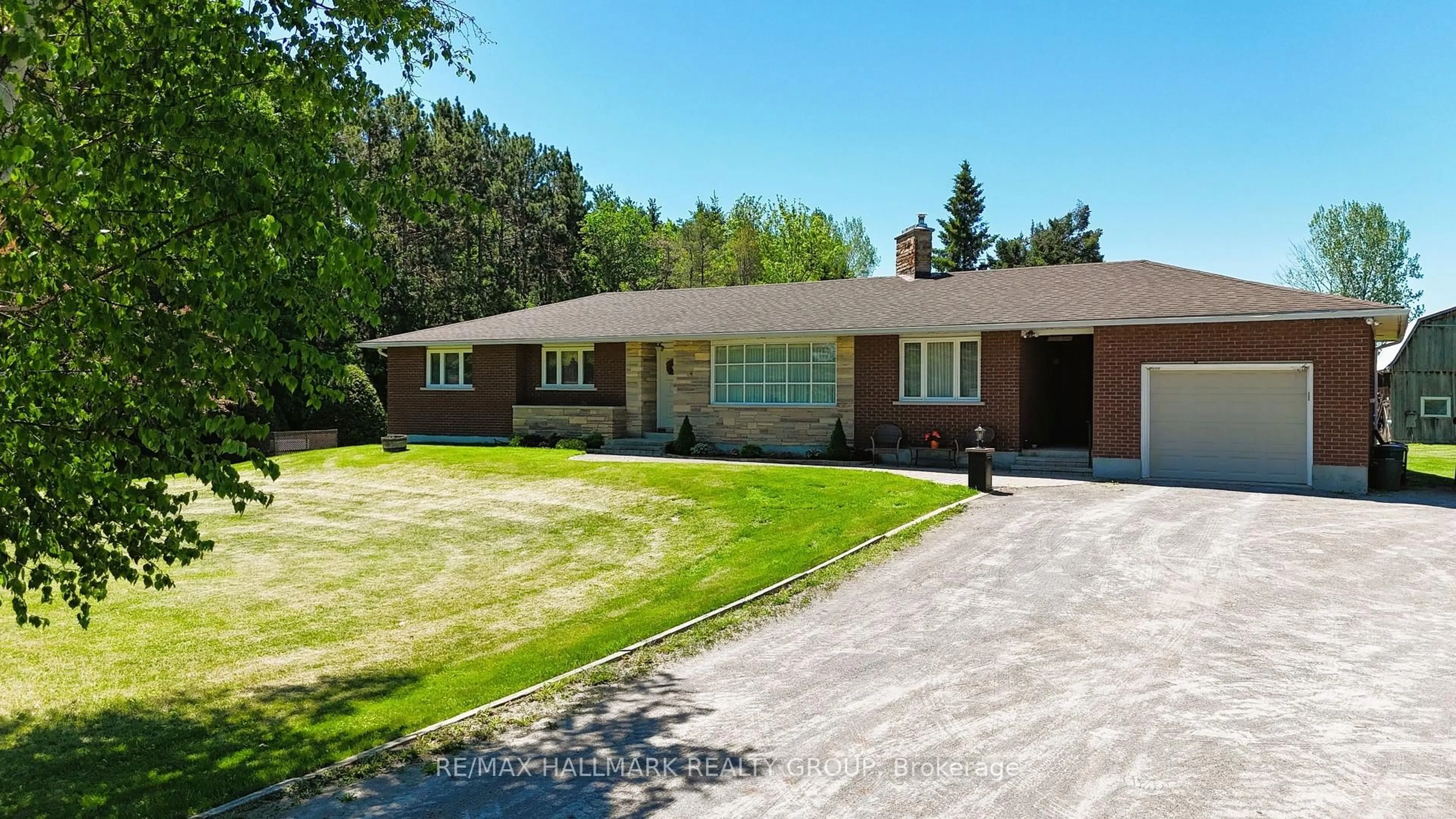 Home with brick exterior material, street for 1755 Marchurst Rd, Ottawa Ontario K2K 1X7