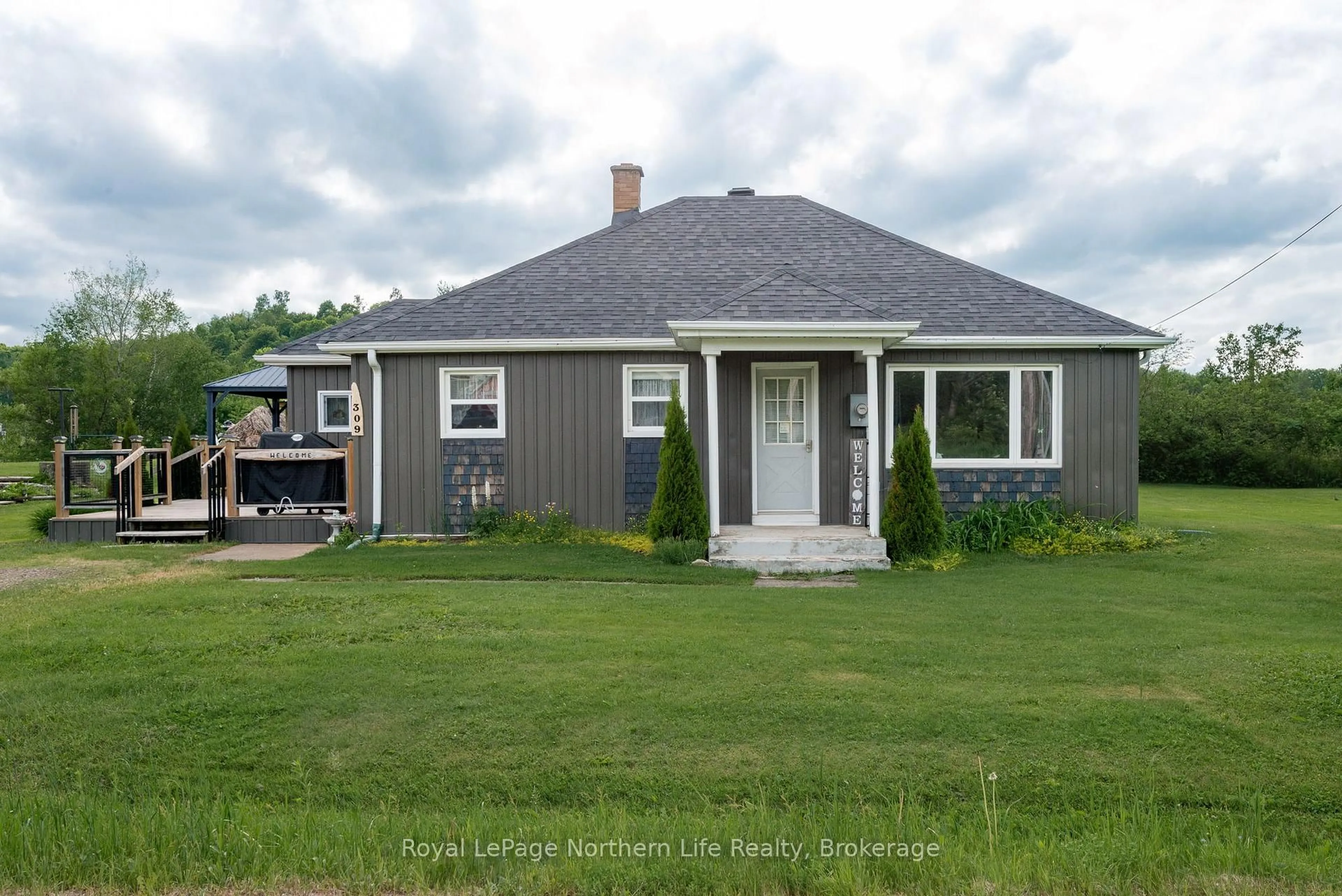 Home with vinyl exterior material, street for 309 Mark St, Bonfield Ontario P0H 1E0