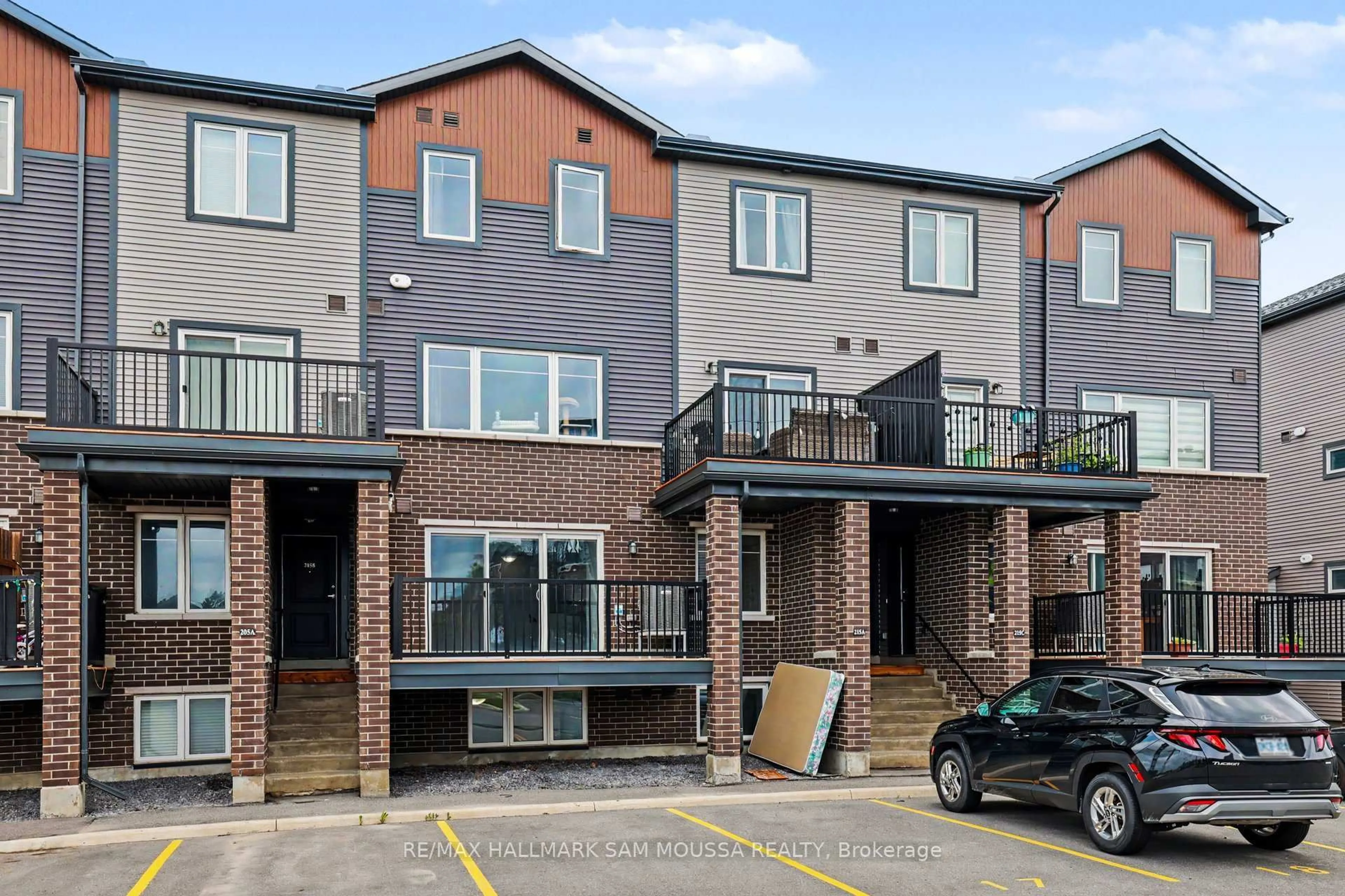 A pic from outside/outdoor area/front of a property/back of a property/a pic from drone, street for 215 Eldorado Private #A, Ottawa Ontario K2K 0N9
