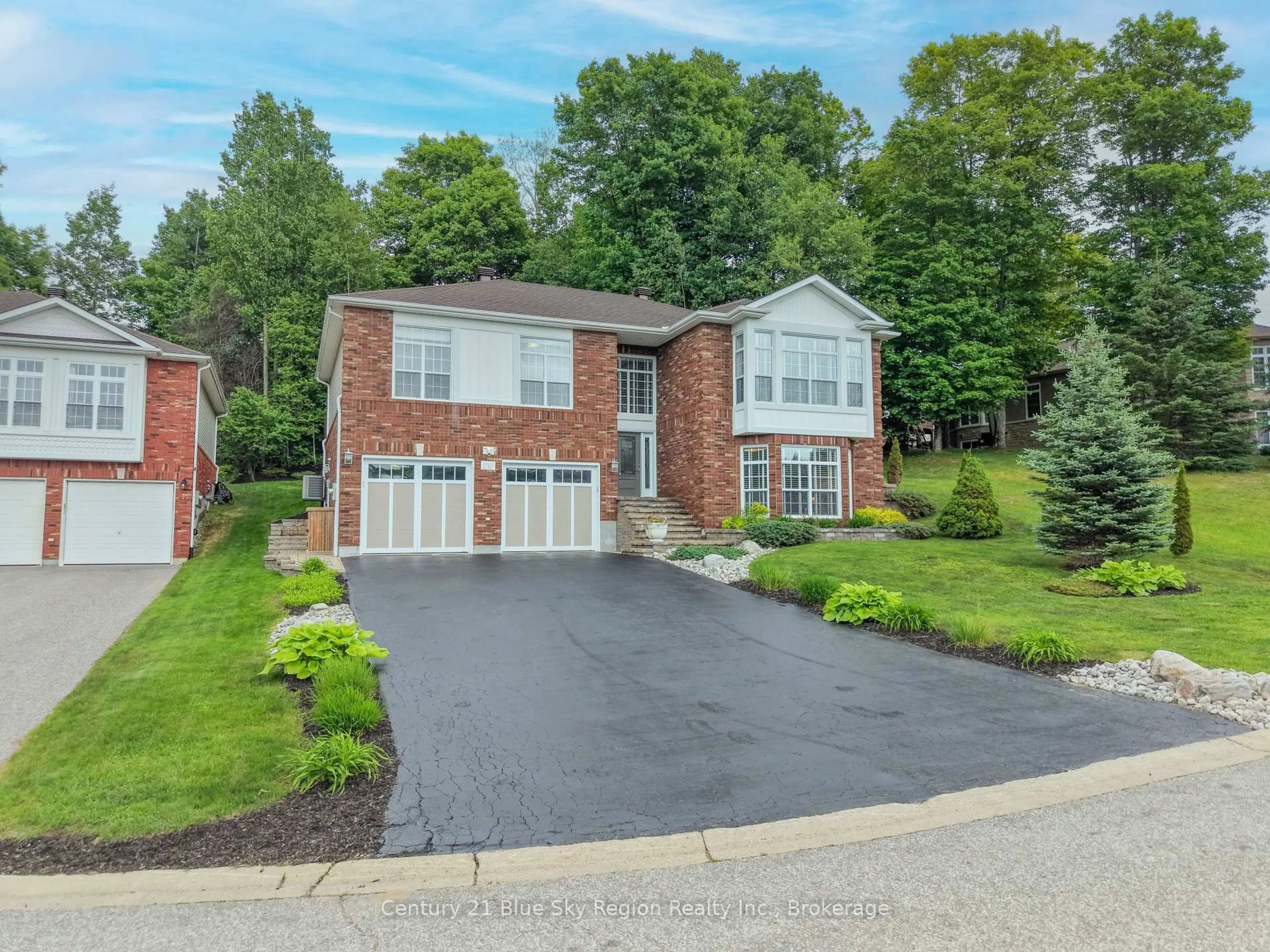 Home with brick exterior material, street for 69 Kenwood Hills Dr, North Bay Ontario P1C 1M3